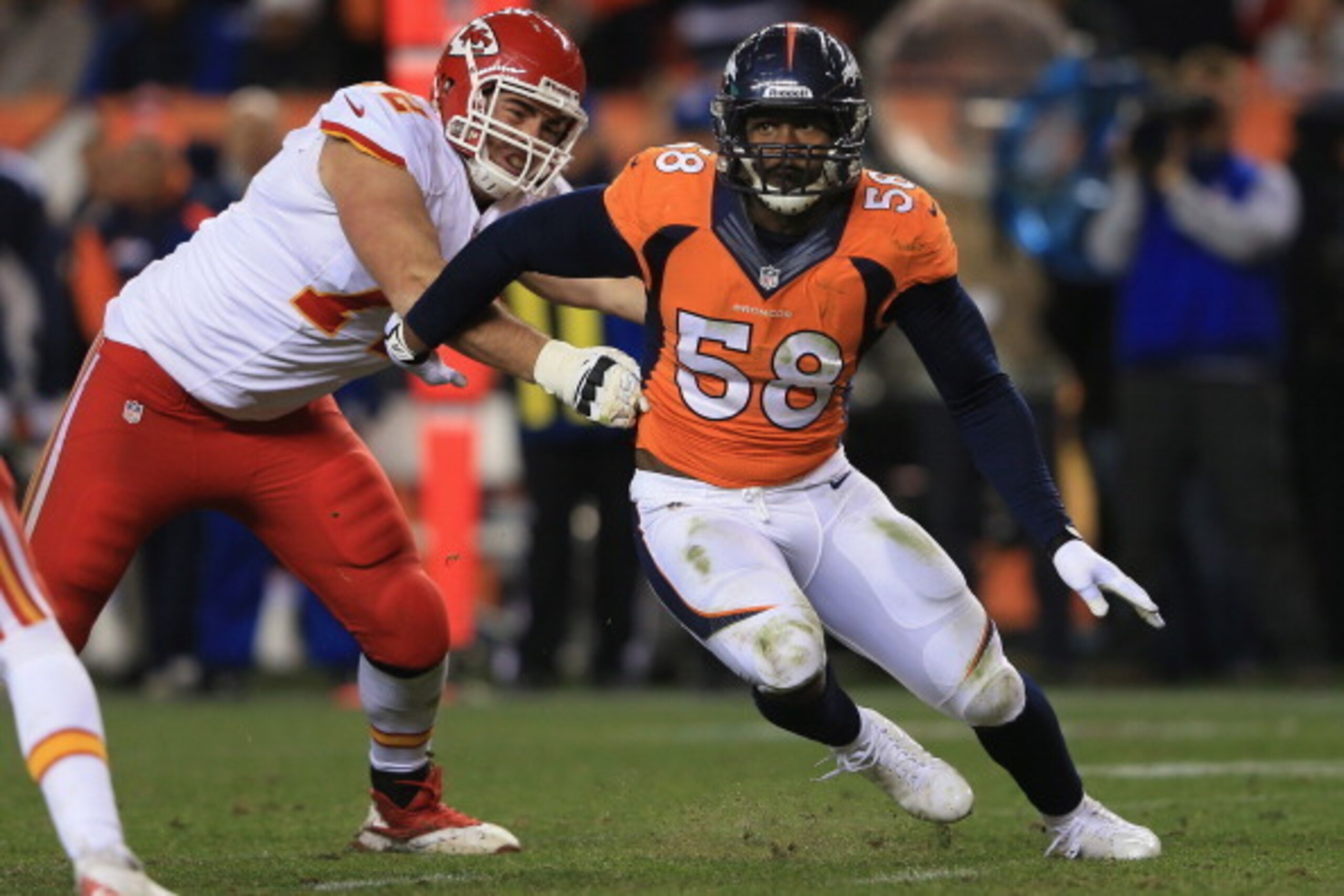 DENVER, CO - NOVEMBER 17:  Outside linebacker Von Miller #58 of the Denver Broncos gets around the block of offensive tackle Eric Fisher #72 of the Kansas City Chiefs at Sports Authority Field at Mile High on November 17, 2013 in Denver, Colorado. The Bro