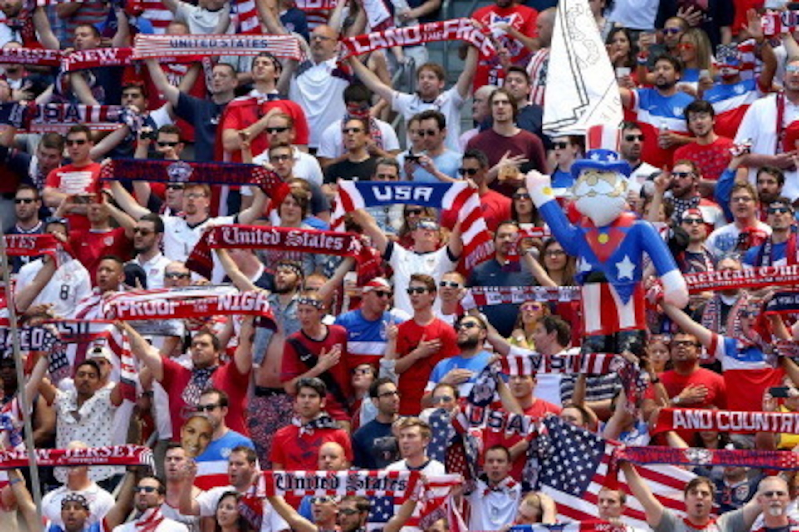 HARRISON, NJ - JUNE 01:  United States fans hold up their scarves during the national anthem before the match against Turkey during an international friendly match at Red Bull Arena on June 1, 2014 in Harrison, New Jersey.  (Photo by Elsa/Getty Images)