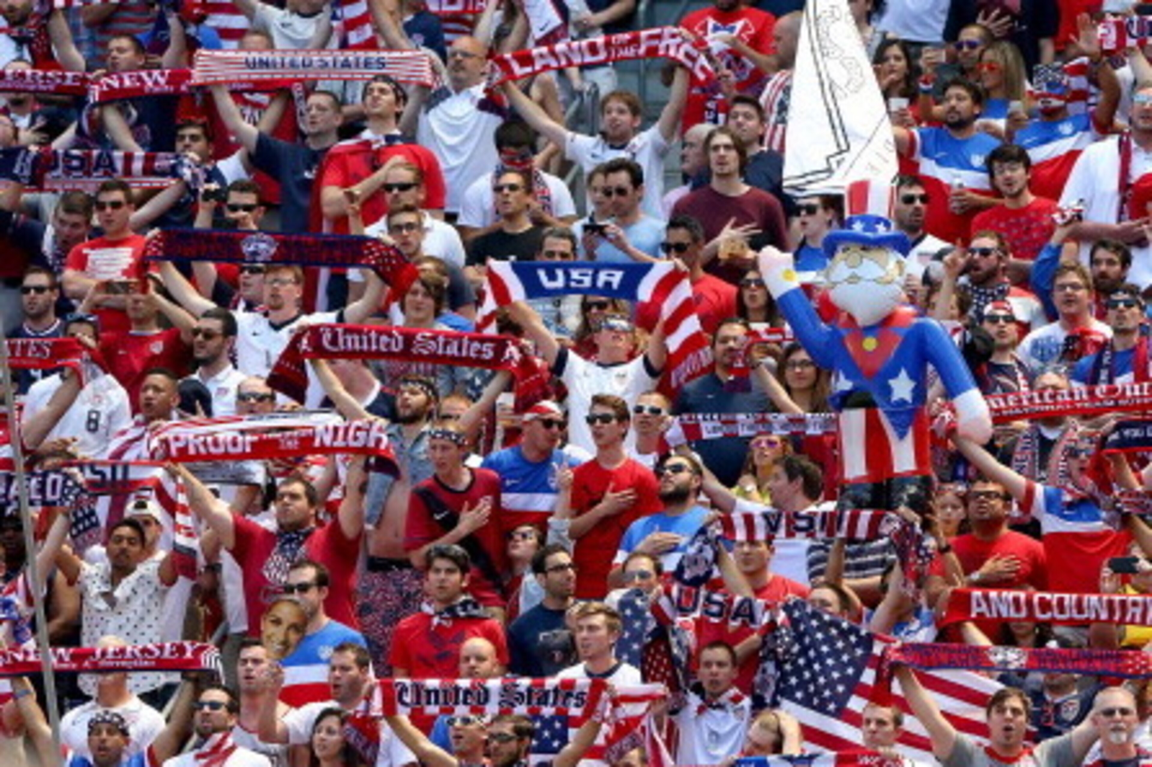 HARRISON, NJ - JUNE 01:  United States fans hold up their scarves during the national anthem before the match against Turkey during an international friendly match at Red Bull Arena on June 1, 2014 in Harrison, New Jersey.  (Photo by Elsa/Getty Images)