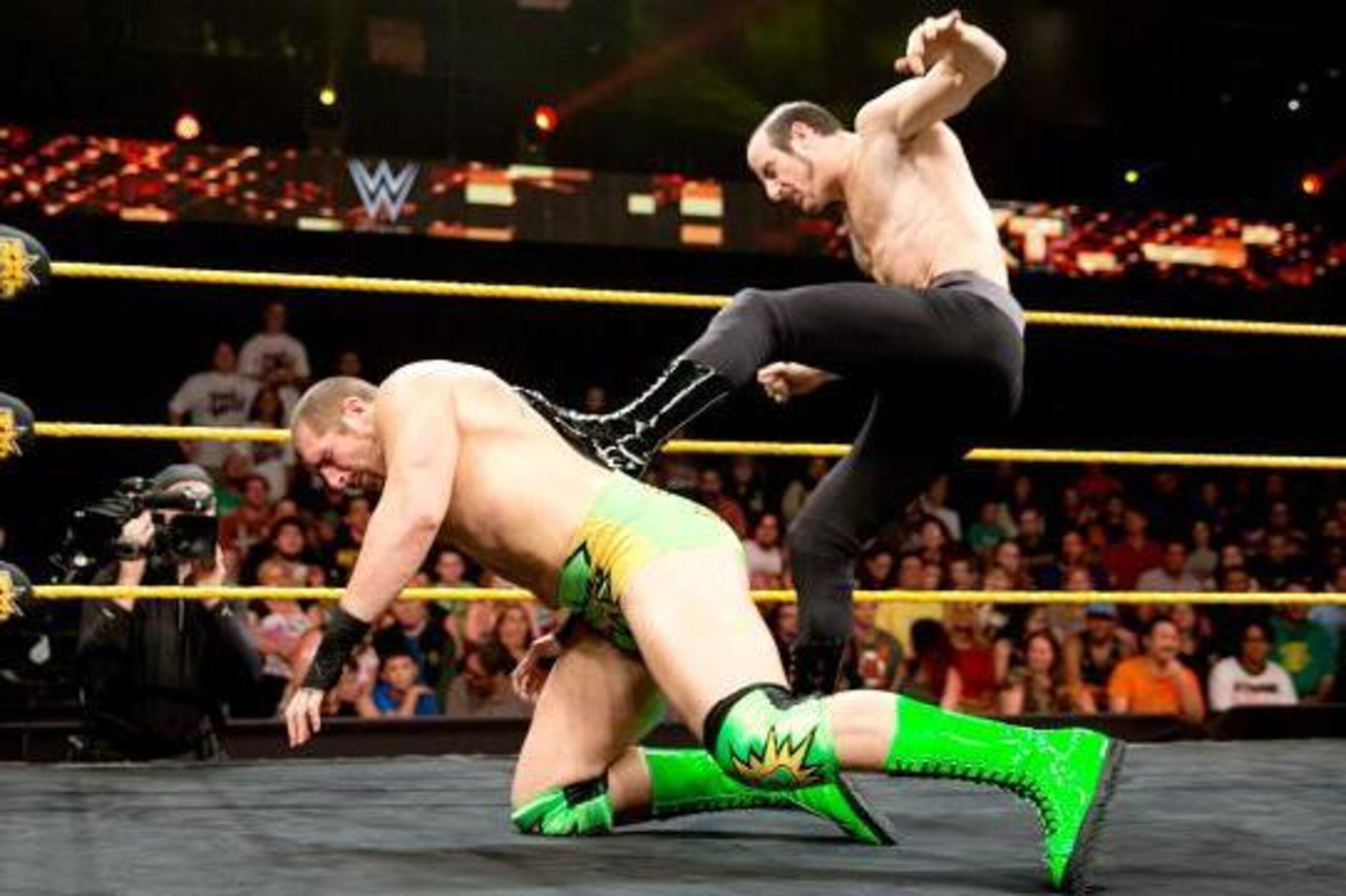 Aiden English stomps on Mojo Rawley.