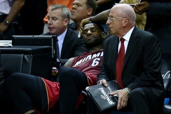 SAN ANTONIO, TX - JUNE 05:  LeBron James #6 of the Miami Heat sits on the bench after leaving the game in the fourth quarter with cramps against the San Antonio Spurs during Game One of the 2014 NBA Finals at the AT&T Center on June 5, 2014 in San Antonio