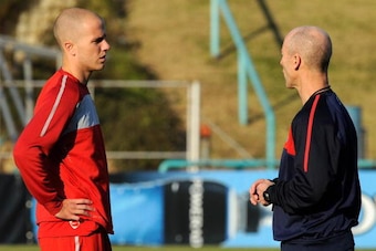 PRETORIA, SOUTH AFRICA - JUNE 20:  Head coach Bob Bradley of  US national football team talks with his son midfielder Michael Bradley during training session at Pilditch Stadium on June 20, 2010 in Pretoria, South Africa. US will play their next World Cup