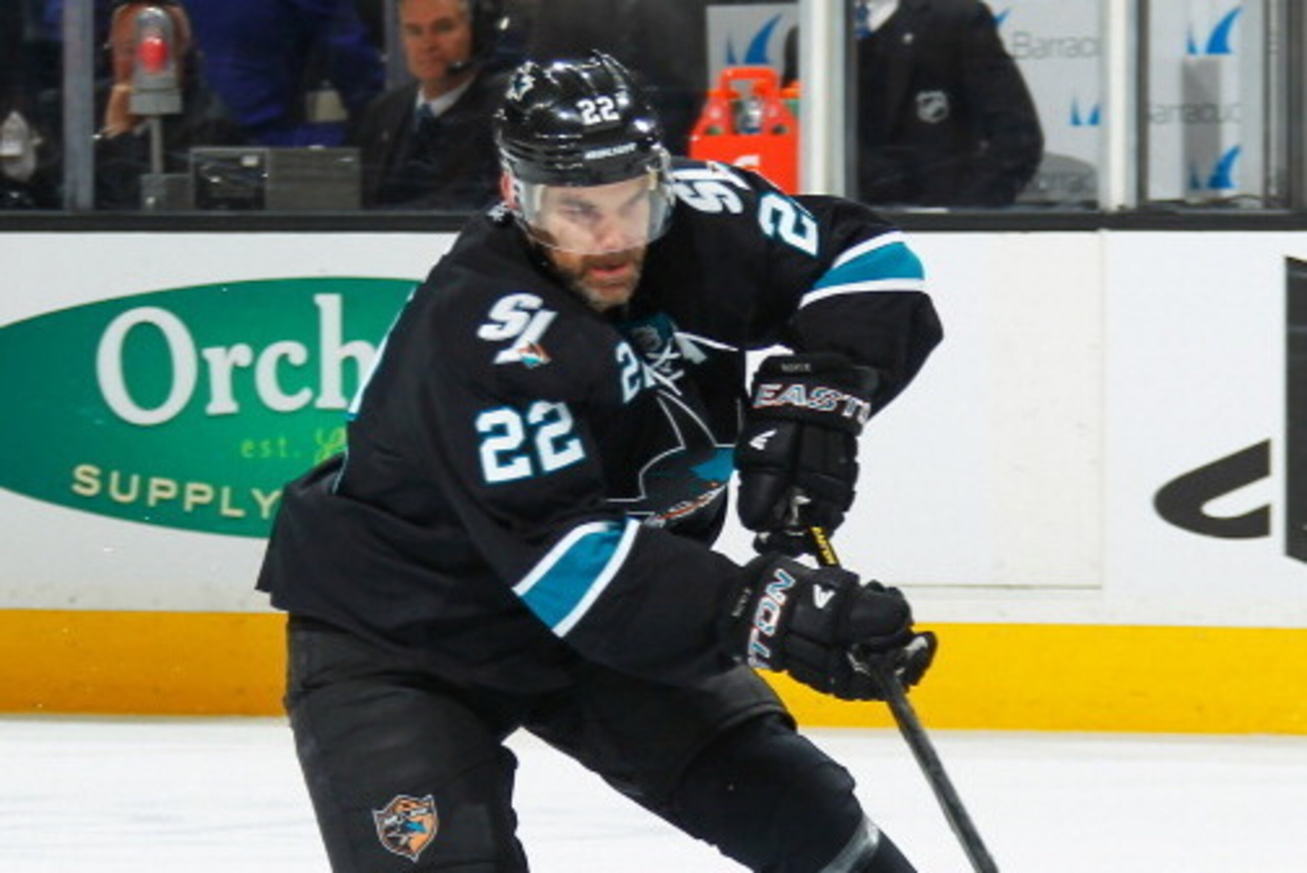 SAN JOSE, CA - APRIL 26: Dan Boyle #22 of the San Jose Sharks handles the puck against the Los Angeles Kings in Game Five of the First Round of the 2014 Stanley Cup Playoffs at SAP Center on April 26, 2014 in San Jose, California. (Photo by Don Smith/NHLI