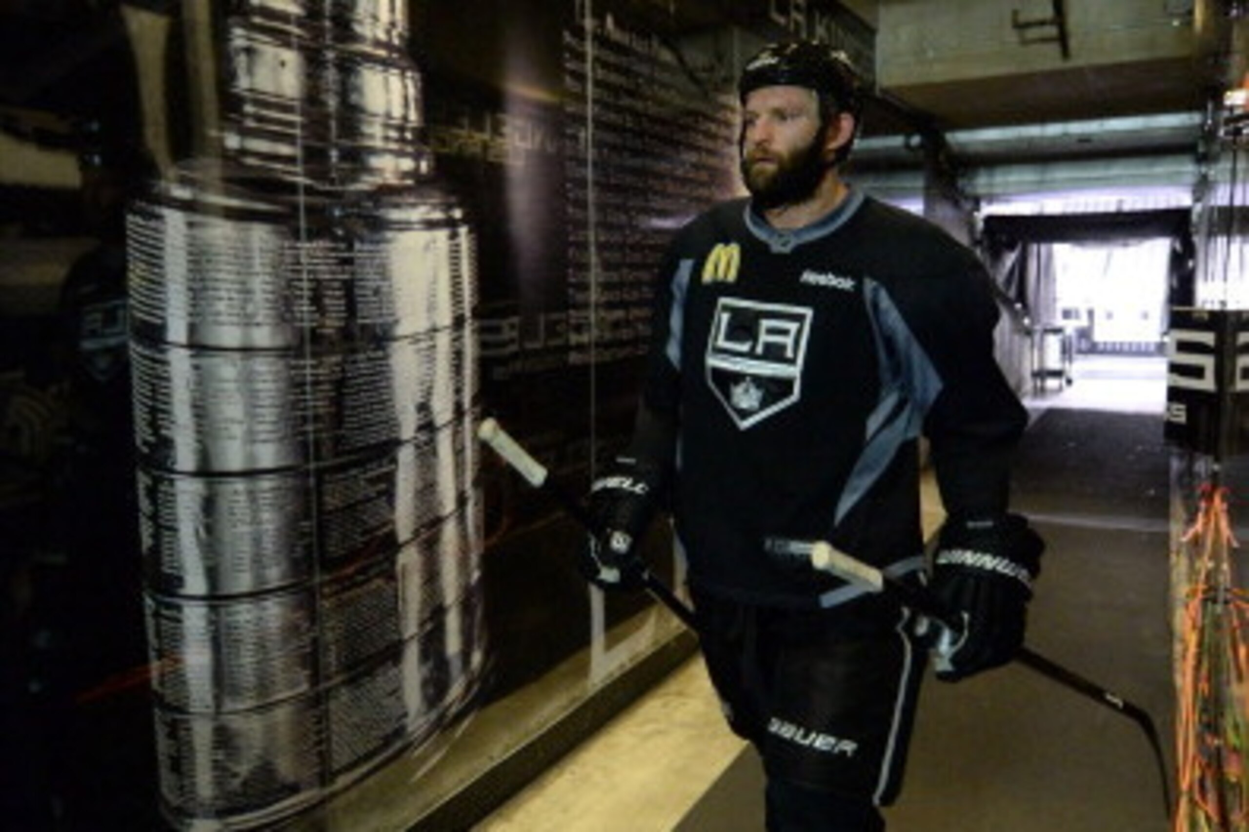 LOS ANGELES, CA - JUNE 3:  Robyn Regehr #44 of the Los Angeles Kings walks to the locker room before the 2014 NHL Stanley Cup Final Media Day at Staples Center on June 3, 2014 in Los Angeles, California. (Photo by Andrew D. Bernstein/NHLI via Getty Images