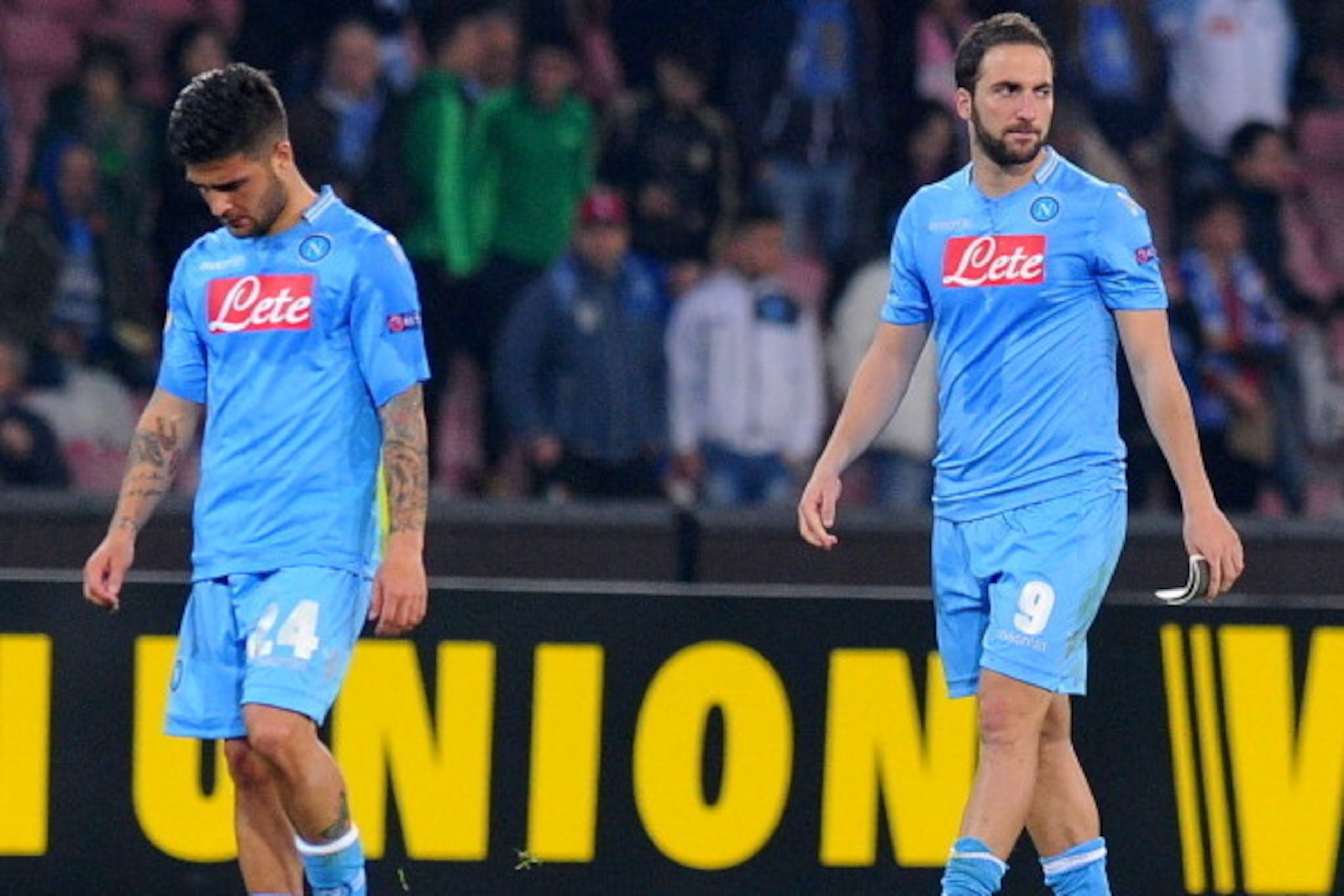 NAPLES, ITALY - MARCH 20:  Lorenzo Insigne and Gonzalo Higuain of SSC Napoli look dejected after the UEFA Europa League Round of 16 match between SSC Napoli and FC Porto at Stadio San Paolo on March 20, 2014 in Naples, Italy.  (Photo by Giuseppe Bellini/G