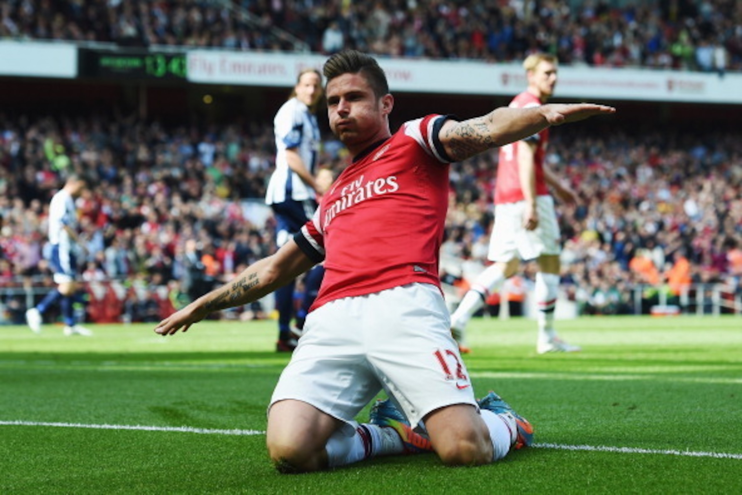 LONDON, ENGLAND - MAY 04:  Olivier Giroud of Arsenal after scoring during the Barclays Premier League match between Arsenal and West Bromwich Albion at the Emirates Stadium on May 4, 2014 in London, England.  (Photo by Shaun Botterill/Getty Images)