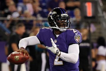 BALTIMORE, MD - AUGUST 15:  Quarterback Tyrod Taylor #2 of the Baltimore Ravens drops back to pass against the Atlanta Falcons during a preseason game at M&T Bank Stadium on August 15, 2013 in Baltimore, Maryland.  (Photo by Rob Carr/Getty Images)