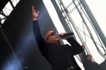 May 18, 2013; Baltimore, MA, USA; Pitbull performs during Infieldfest prior to the 138th running of the Preakness Stakes at Pimlico race course. Mandatory Credit: Andy Jones-USA TODAY Sports