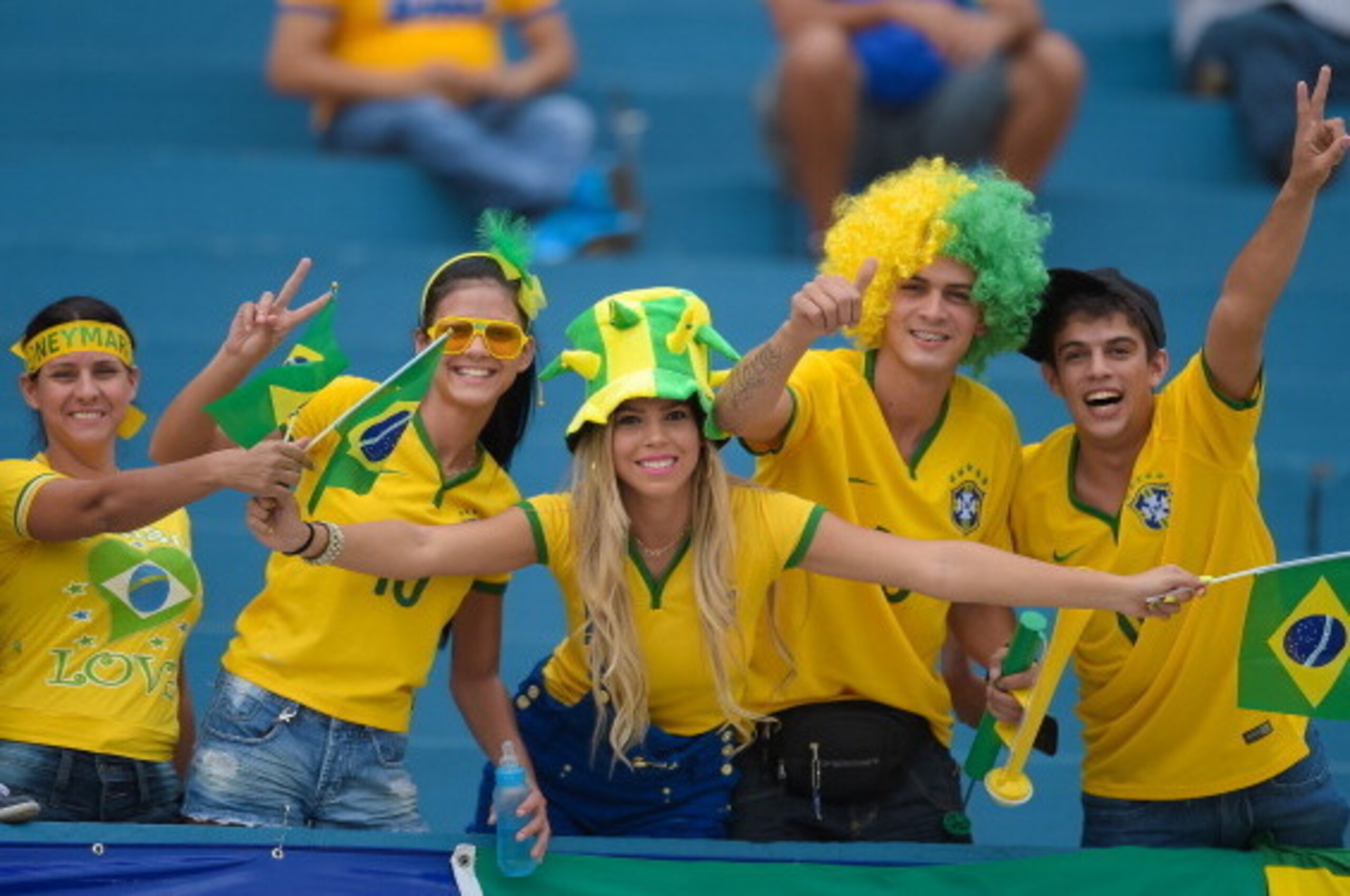 GOIANIA, BRAZIL - JUNE 03:  Fans of Brazil pose for photo before the International Friendly Match between Brazil and Panama at Serra Dourada Stadium on June 03, 2014 in Goiania, Brazil. (Photo by Buda Mendes/Getty Images)