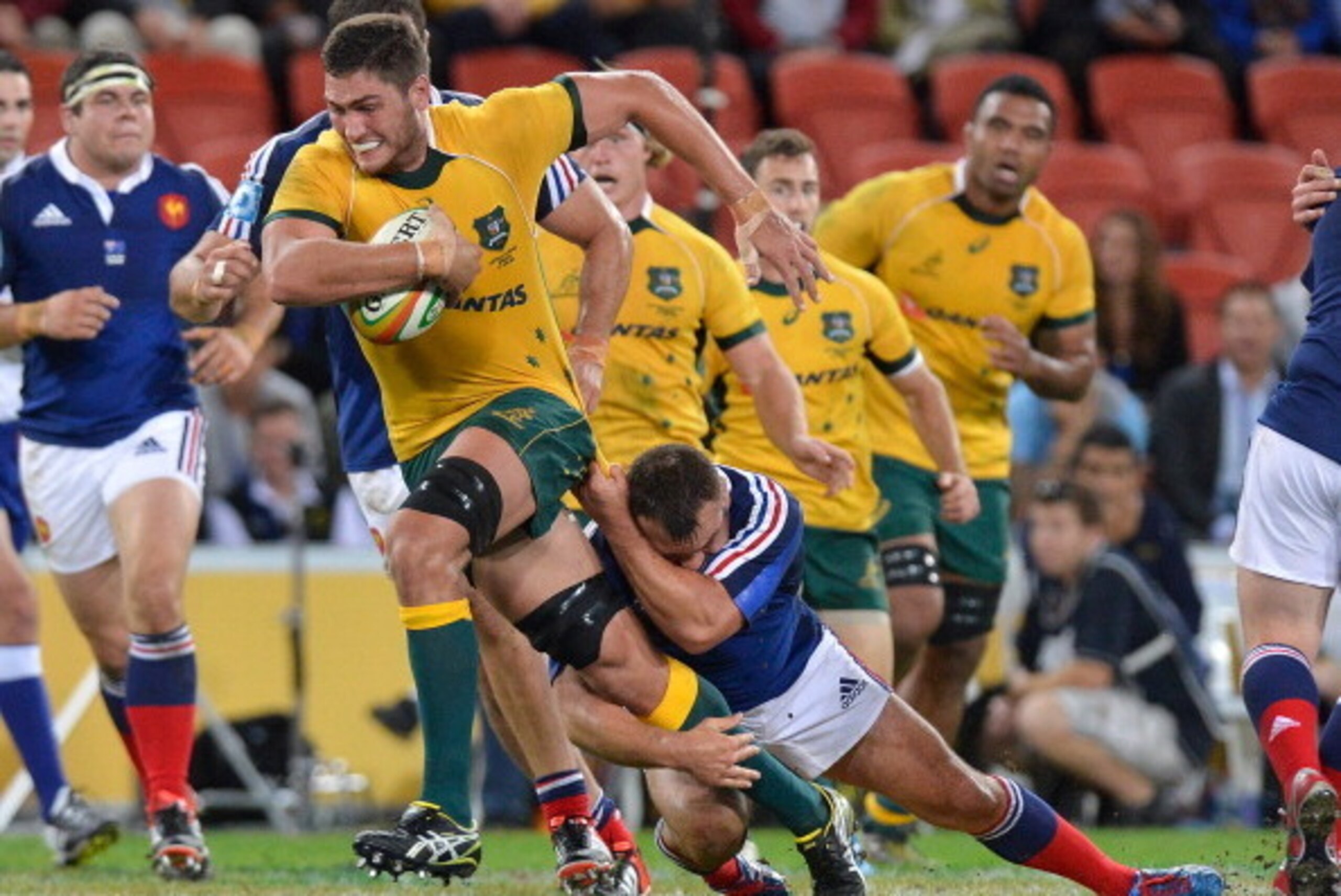 BRISBANE, AUSTRALIA - JUNE 07: Rob Simmons of the Wallabies takes on the defence during the First International Test Match between the Australian Wallabies and France at Suncorp Stadium on June 7, 2014 in Brisbane, Australia.  (Photo by Bradley Kanaris/Ge