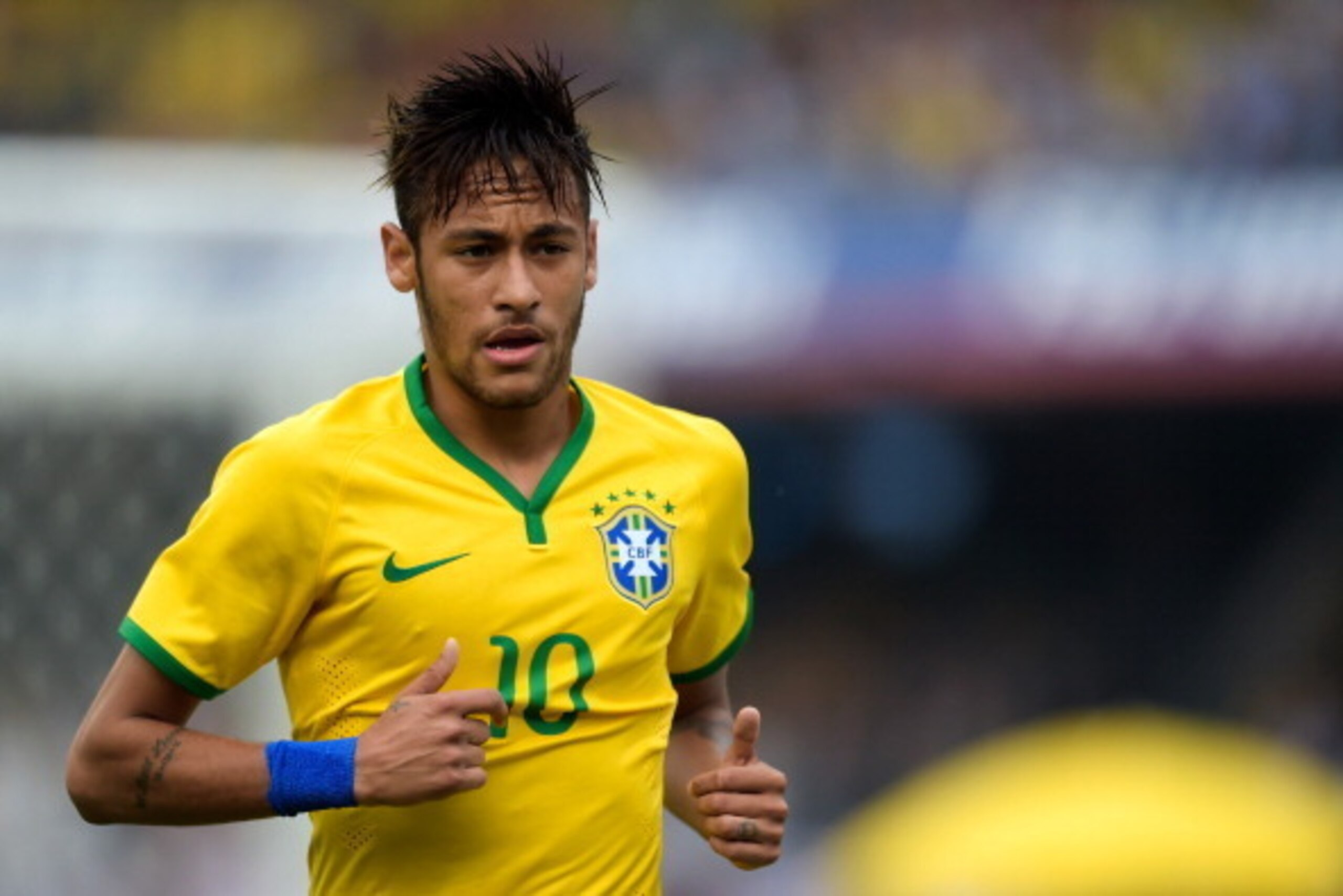 SAO PAULO, BRAZIL - JUNE 06:  Neymar  of Brazil in action during the International Friendly Match between Brazil and Serbia at Morumbi Stadium on June 06, 2014 in Sao Paulo, Brazil.  (Photo by Buda Mendes/Getty Images)