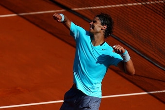 PARIS, FRANCE - JUNE 06:  Rafael Nadal of Spain celebrates victory in his men's singles match against Andy Murray of Great Britain on day thirteen of the French Open at Roland Garros on June 6, 2014 in Paris, France.  (Photo by Dan Istitene/Getty Images)
