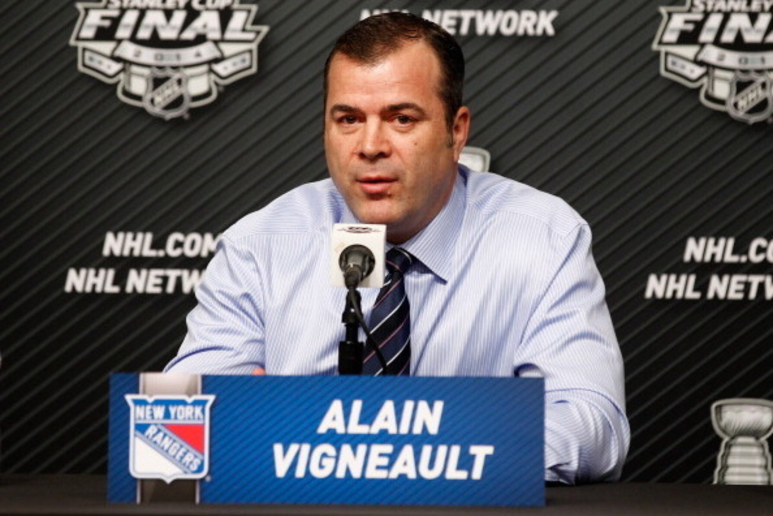LOS ANGELES, CA - JUNE 04:  Head coach Alain Vigneault of the New York Rangers speaks to the media before Game One of the 2014 Stanley Cup Final at Staples Center on June 4, 2014 in Los Angeles, California.  (Photo by Rebecca Taylor/NHLI via Getty Images)