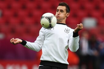 WARSAW, POLAND - JUNE 27: Miroslav Klose controls the ball during a Germany training session ahead of their UEFA EURO 2012 semi-final match against Italy at the National Stadium on June 27, 2012 in Warsaw, Poland.  (Photo by Joern Pollex/Getty Images)