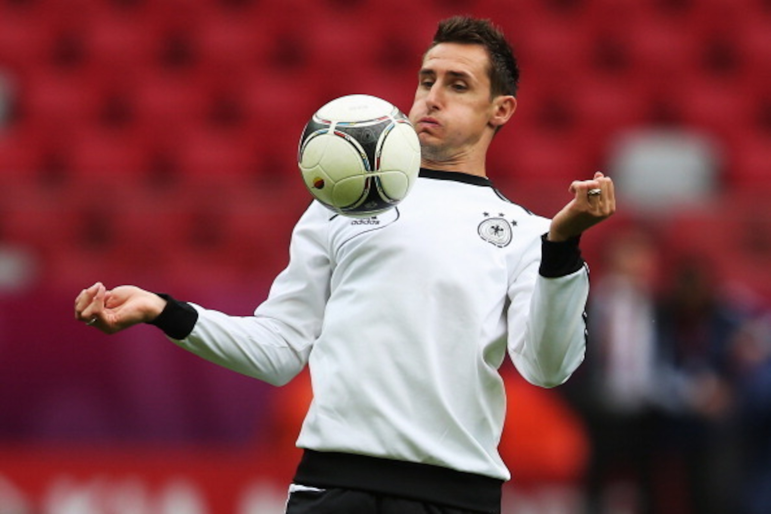 WARSAW, POLAND - JUNE 27: Miroslav Klose controls the ball during a Germany training session ahead of their UEFA EURO 2012 semi-final match against Italy at the National Stadium on June 27, 2012 in Warsaw, Poland.  (Photo by Joern Pollex/Getty Images)