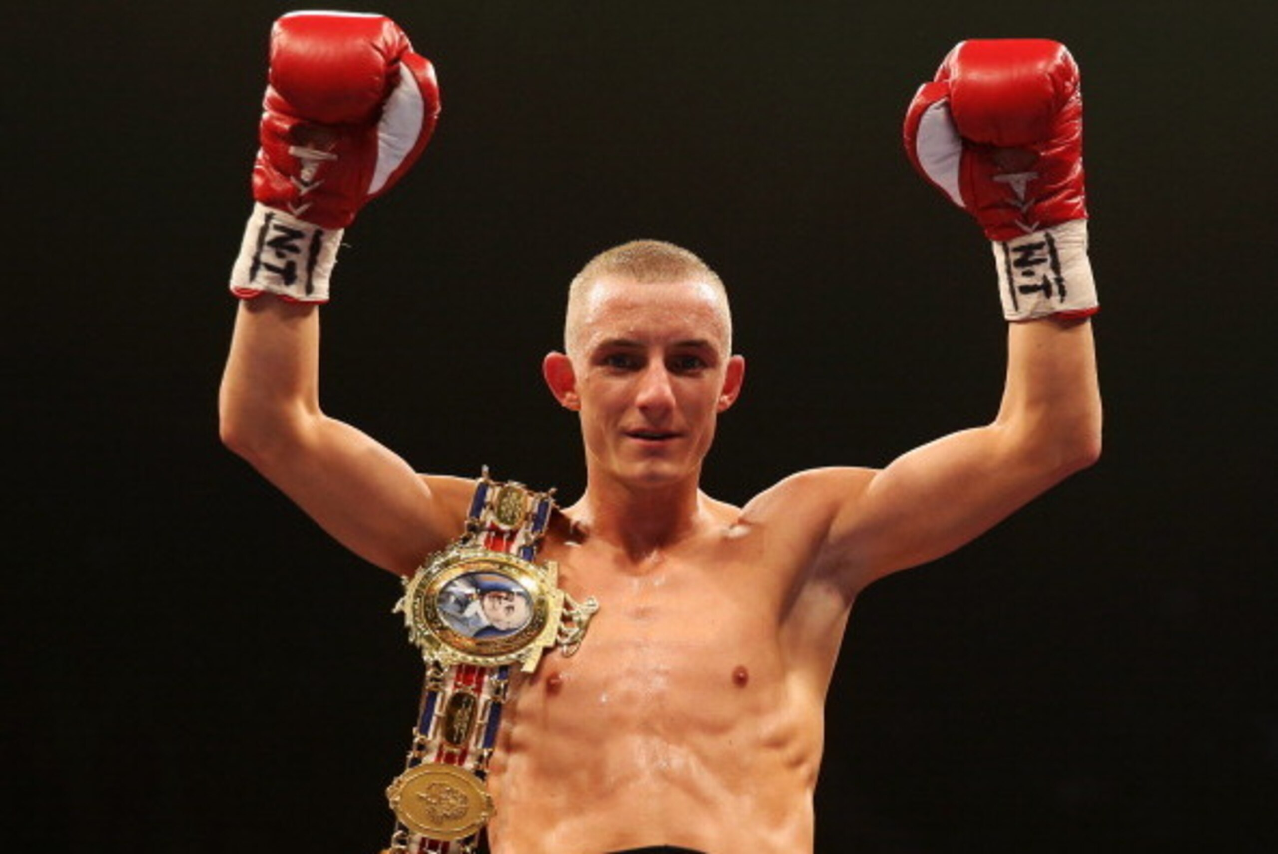 LONDON, ENGLAND - APRIL 20:  Paul Butler celebrates victory over Yaqub Kareem after their Commonwealth Super-Flyweight Championship bout at Wembley Arena on April 20, 2013 in London, England.  (Photo by Scott Heavey/Getty Images)