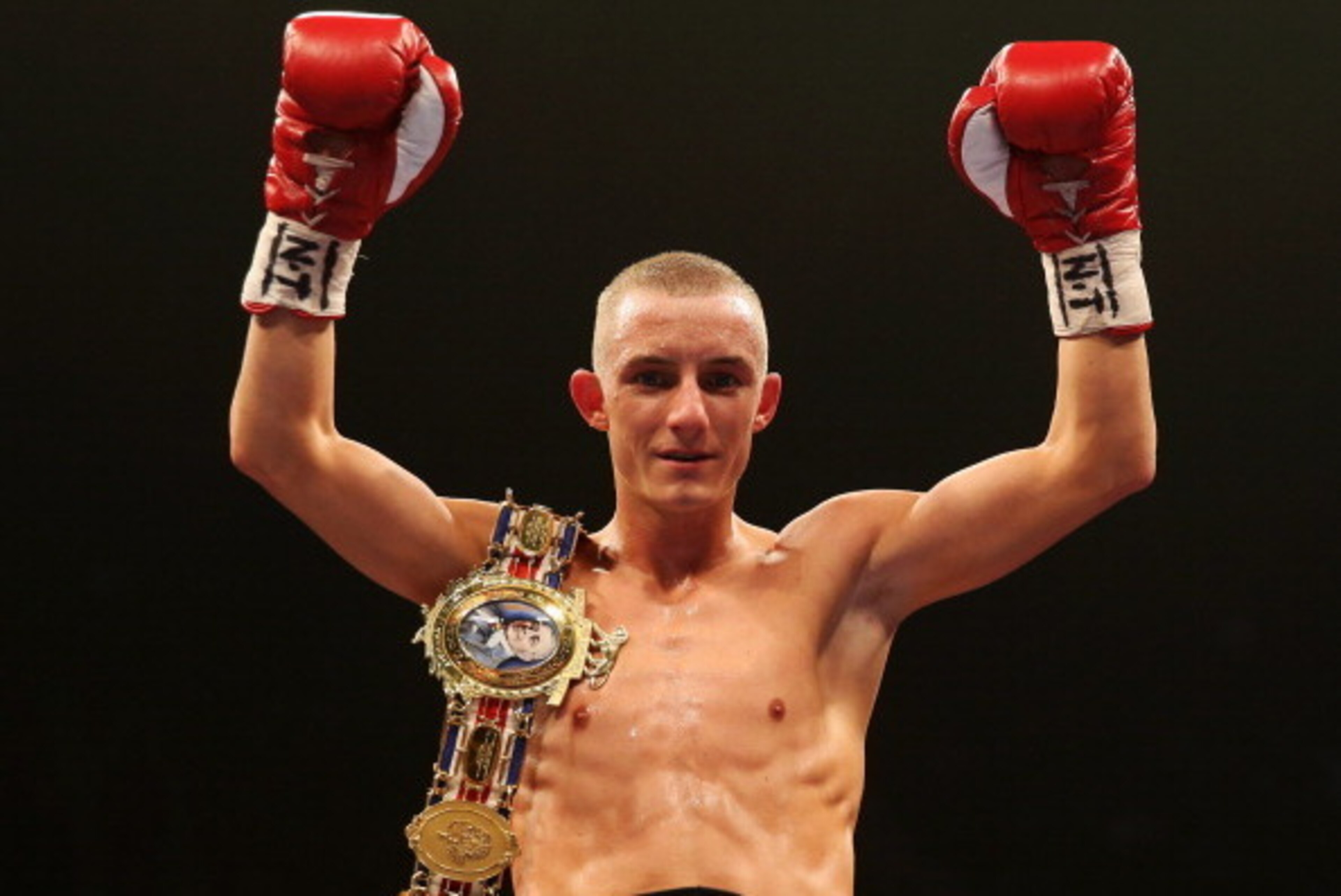 LONDON, ENGLAND - APRIL 20:  Paul Butler celebrates victory over Yaqub Kareem after their Commonwealth Super-Flyweight Championship bout at Wembley Arena on April 20, 2013 in London, England.  (Photo by Scott Heavey/Getty Images)