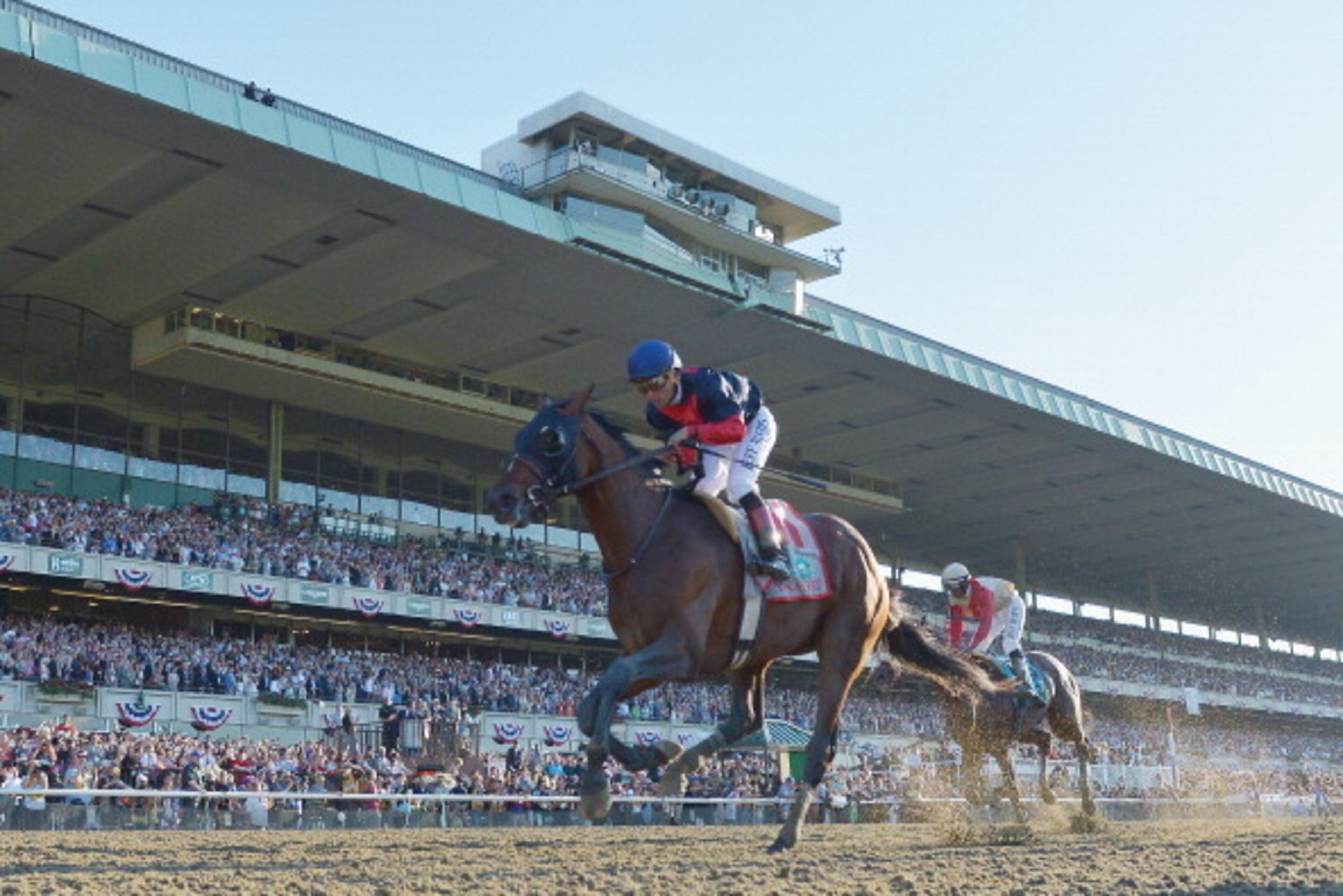 ELMONT, NY - JUNE 07: Tonalist #11, ridden by Joel Rosario, races to the finish line enroute to winning the 146th running of the Belmont Stakes at Belmont Park on June 7, 2014 in Elmont, New York. (Photo by Drew Hallowell/Getty Images) ELMONT, NY - JUNE 07: Tonalist #11, ridden by Joel Rosario, races to the finish line enroute to winning the 146th running of the Belmont Stakes at Belmont Park on June 7, 2014 in Elmont, New York. (Photo by Drew Hallowell/Getty Images)
