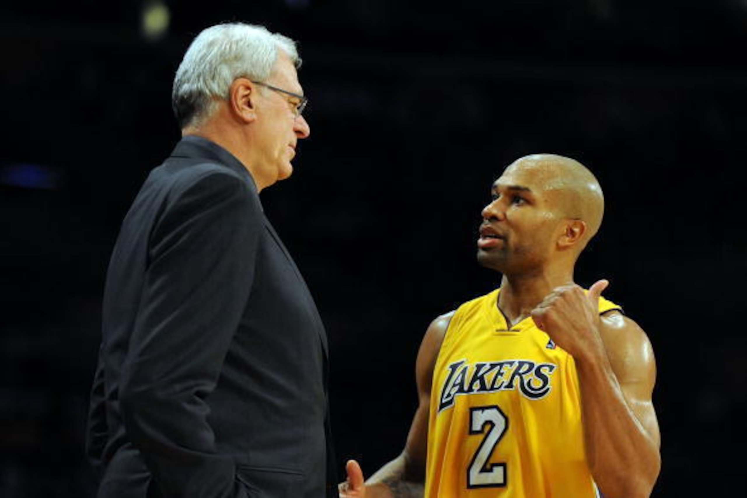 LOS ANGELES, CA - DECEMBER 01: Derek Fisher #2 of the Los Angeles Lakers speaks to Head Coach Phil Jackson during the game against the New Orleans Hornets at Staples Center on December 1, 2009 in Los Angeles, California. (Photo by Harry How/Getty Images LOS ANGELES, CA - DECEMBER 01: Derek Fisher #2 of the Los Angeles Lakers speaks to Head Coach Phil Jackson during the game against the New Orleans Hornets at Staples Center on December 1, 2009 in Los Angeles, California. (Photo by Harry How/Getty Images