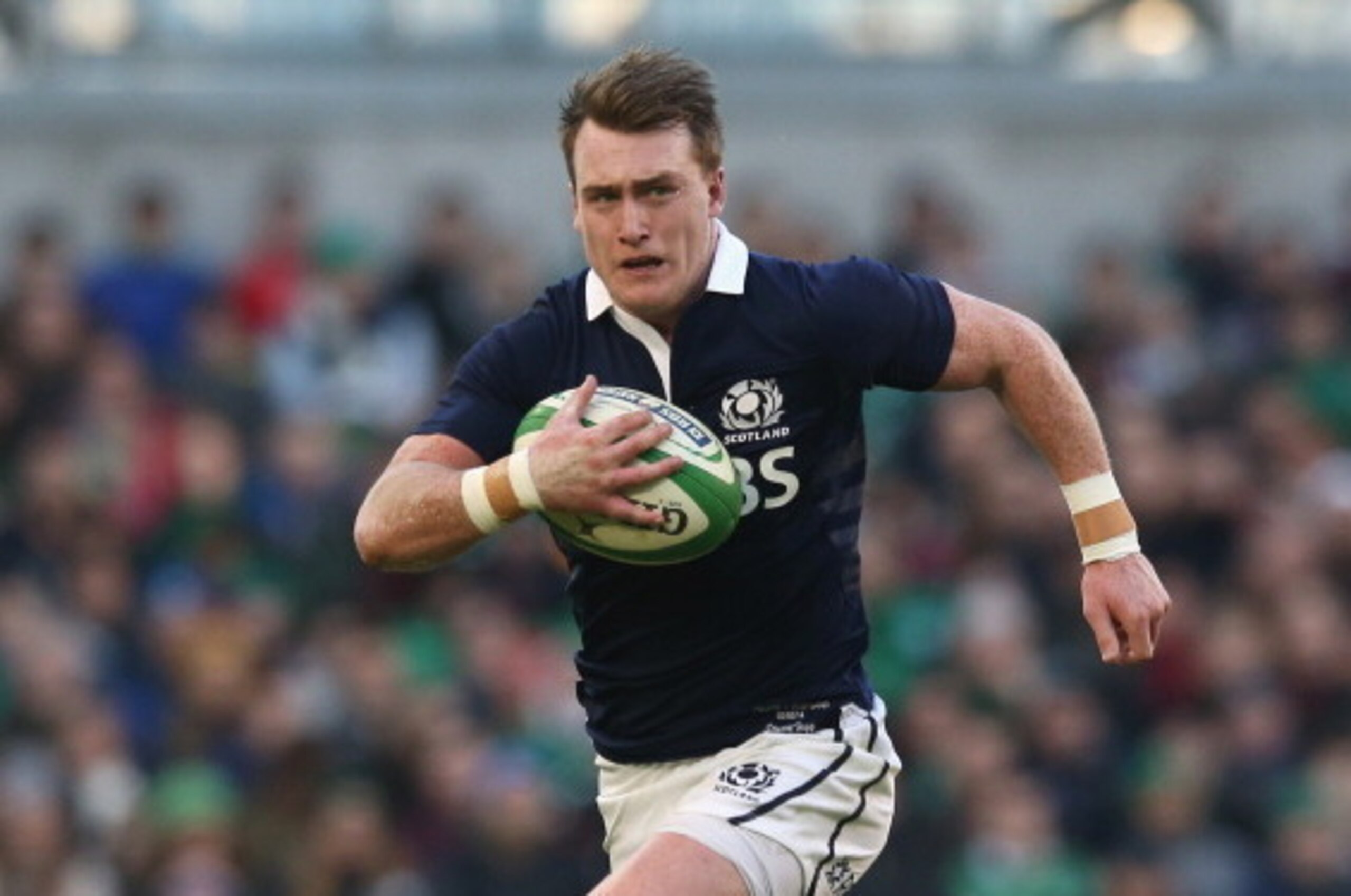 DUBLIN, IRELAND - FEBRUARY 02:  Stuart Hogg of Scotland runs with the ball upfield during the RBS Six Nations match between Ireland and Scotland at the Aviva Stadium on February 2, 2014 in Dublin, Ireland.  (Photo by David Rogers/Getty Images)