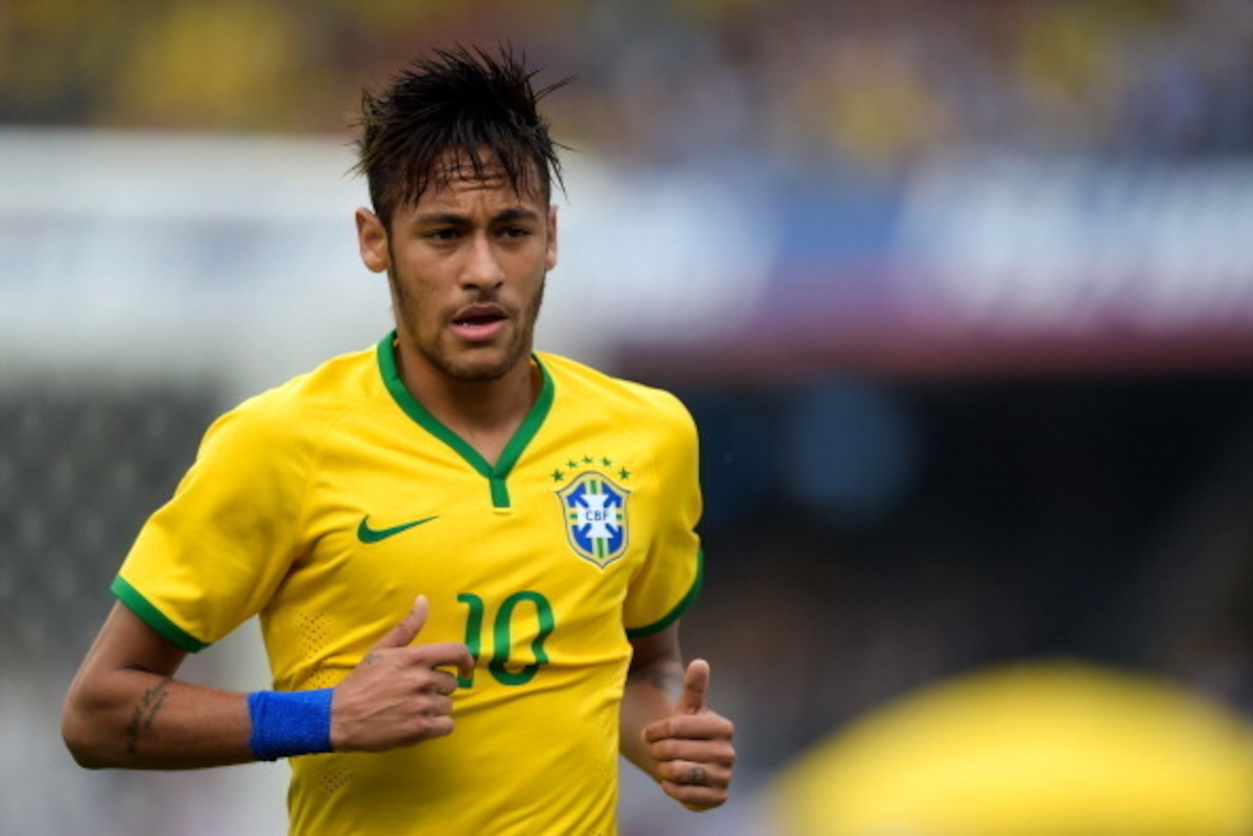 SAO PAULO, BRAZIL - JUNE 06:  Neymar  of Brazil in action during the International Friendly Match between Brazil and Serbia at Morumbi Stadium on June 06, 2014 in Sao Paulo, Brazil.  (Photo by Buda Mendes/Getty Images)