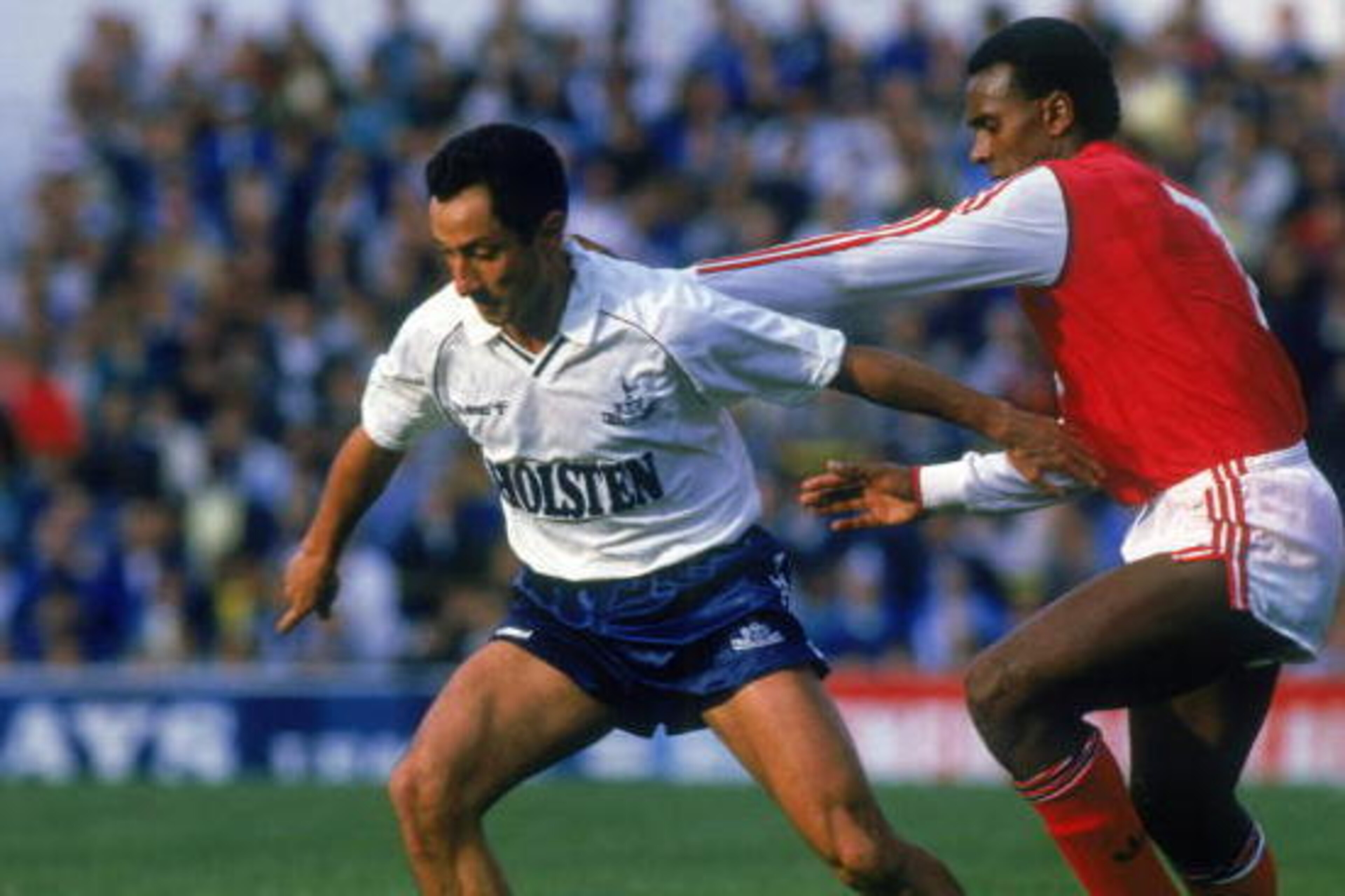 LONDON - OCTOBER 18:  Ossie Ardiles of Tottenham Hotspur shields the ball from David Rocastle of Arsenal during the Barclays League Division One match held on October 18, 1987 played at White Hart Lane, in London. Arsenal won the match 2-1. (Photo by Simo