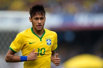 SAO PAULO, BRAZIL - JUNE 06:  Neymar  of Brazil in action during the International Friendly Match between Brazil and Serbia at Morumbi Stadium on June 06, 2014 in Sao Paulo, Brazil.  (Photo by Buda Mendes/Getty Images)