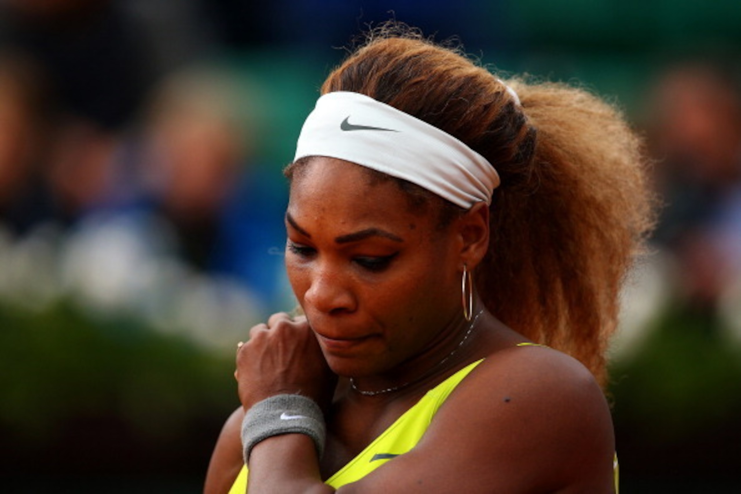 PARIS, FRANCE - MAY 28:  Serena Williams of the United States reacts during her women's singles match against Garbine Muguruza of Spain on day four of the French Open at Roland Garros on May 28, 2014 in Paris, France.  (Photo by Clive Brunskill/Getty Imag