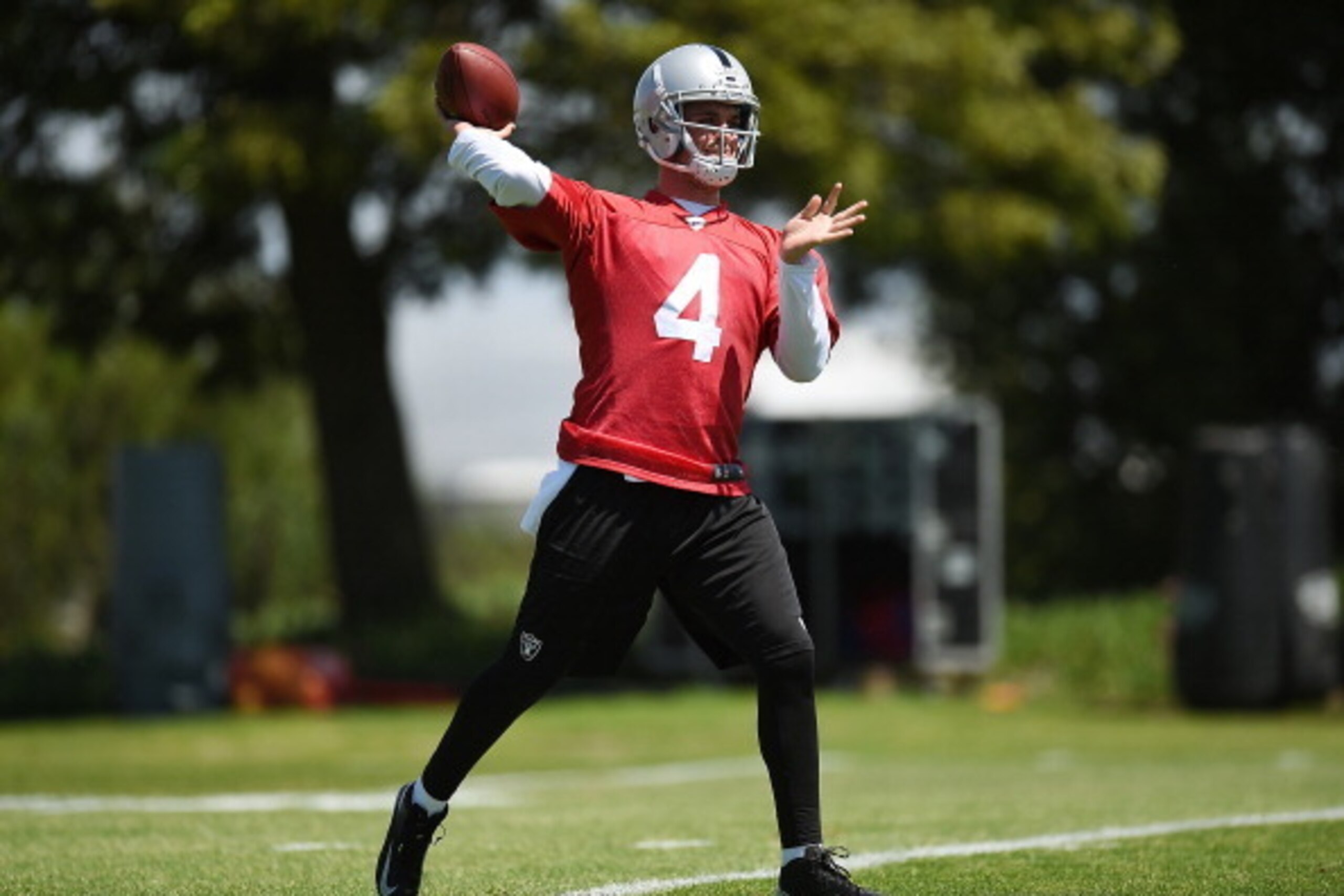 ALAMEDA, CA - MAY 16: Derek Carr #4 of the Oakland Raiders participates in drills during Rookie Minicamp on May 16, 2014 in Alameda, California. (Photo by Thearon W. Henderson/Getty Images) ALAMEDA, CA - MAY 16: Derek Carr #4 of the Oakland Raiders participates in drills during Rookie Minicamp on May 16, 2014 in Alameda, California. (Photo by Thearon W. Henderson/Getty Images)