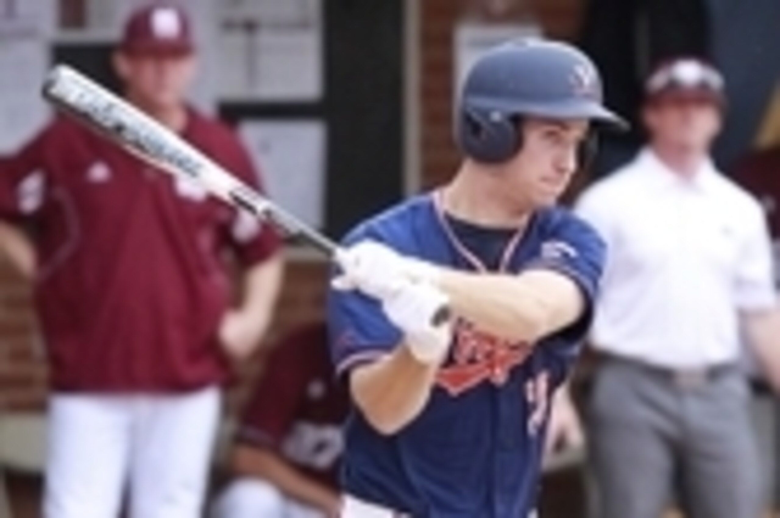 Jun 9, 2013; Charlottesville, VA, USA; Virginia Cavaliers outfielder Mike Papi (38) hits the ball against the Mississippi State Bulldogs in the first inning during the Charlottesville super regional of the 2013 NCAA baseball tournament at Davenport Field.