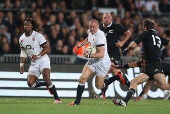 AUCKLAND, NEW ZEALAND - JUNE 07:  Mike Brown of England runs with the ball during the International Test Match between the New Zealand All Blacks and England at Eden Park on June 7, 2014 in Auckland, New Zealand.  (Photo by David Rogers/Getty Images)