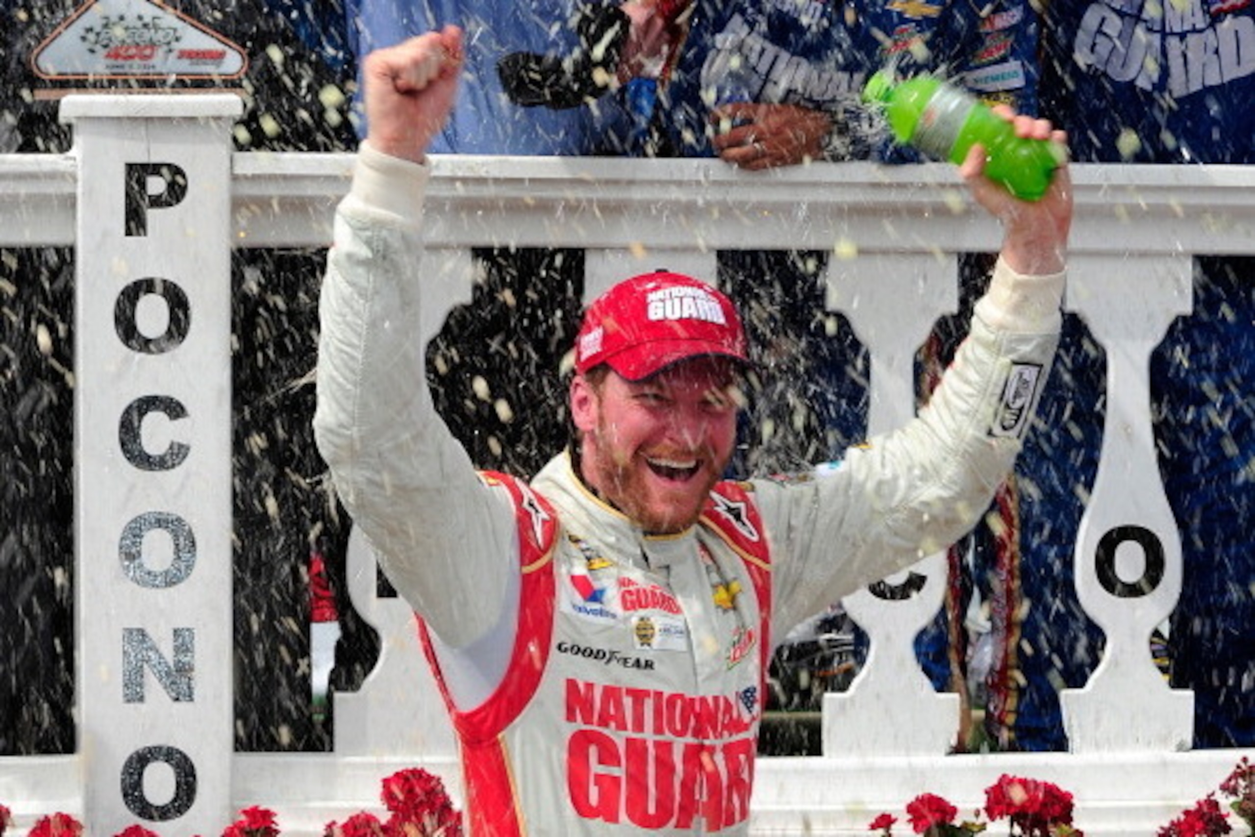 LONG POND, PA - JUNE 08:  Dale Earnhardt Jr., driver of the #88 National Guard Chevrolet, celebrates in Victory Lane after winning during the NASCAR Sprint Cup Series Pocono 400 at Pocono Raceway on June 8, 2014 in Long Pond, Pennsylvania.  (Photo by Jeff