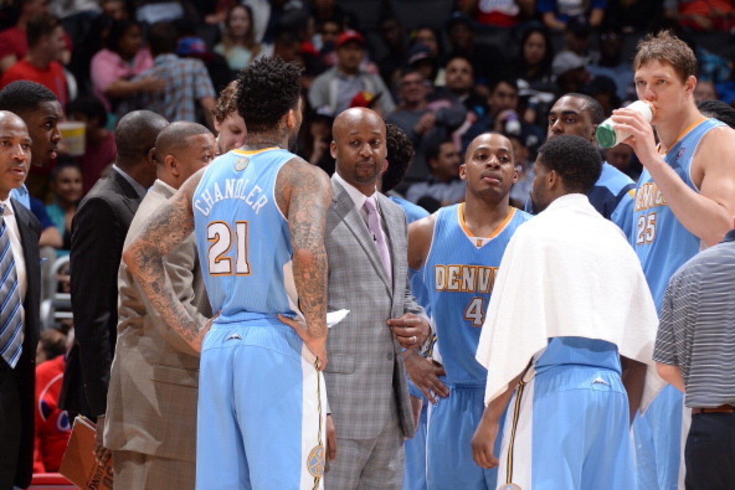 LOS ANGELES, CA - APRIL 15: Head coach Brian Shaw of the Denver Nuggets is seen in the huddle against the Los Angeles Clippers at Staples Center on April 15, 2014 in Los Angeles, California. NOTE TO USER: User expressly acknowledges and agrees that, by do