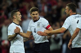 LONDON, ENGLAND - SEPTEMBER 06:  Steven Gerrard of England is congratulated by Jack Wilshere of England on scoring the opening goal during the FIFA 2014 World Cup Qualifying Group H match between England and Moldova at Wembley Stadium on September 6, 2013
