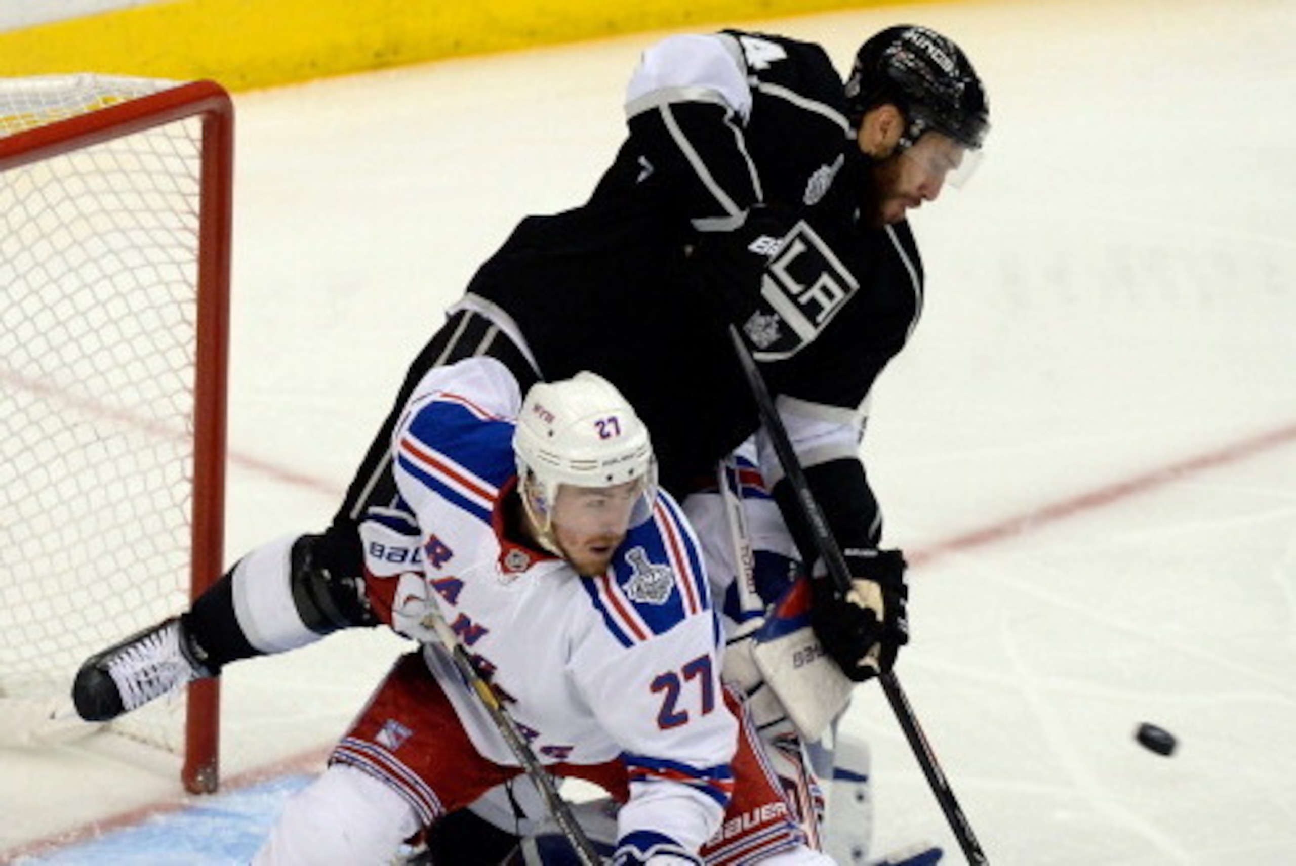 LOS ANGELES, CA - JUNE 07:  Dwight King #74 of the Los Angeles Kings scores a goal past goaltender Henrik Lundqvist #30 of the New York Rangers in the third period during Game Two of the 2014 NHL Stanley Cup Final at the Staples Center on June 7, 2014 in 