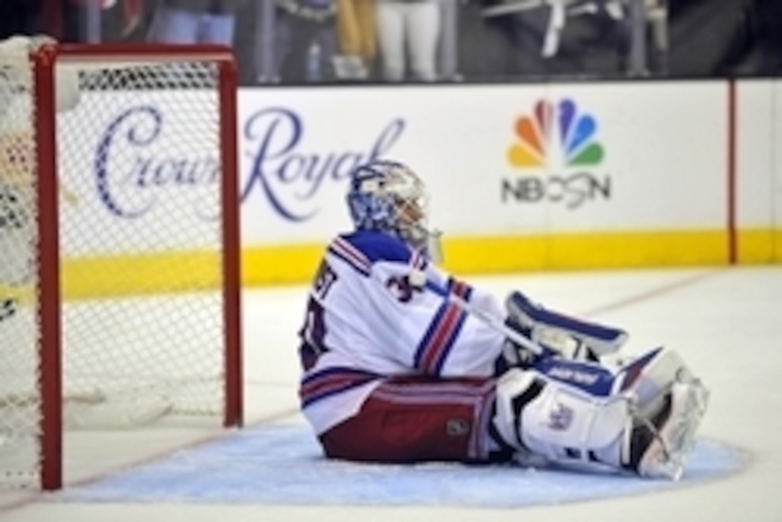 Jun 7, 2014; Los Angeles, CA, USA; New York Rangers goalie Henrik Lundqvist (30) reacts after giving up the game-winning goal to Los Angeles Kings right wing Dustin Brown (not pictured) in the second overtime period during game two of the 2014 Stanley Cup