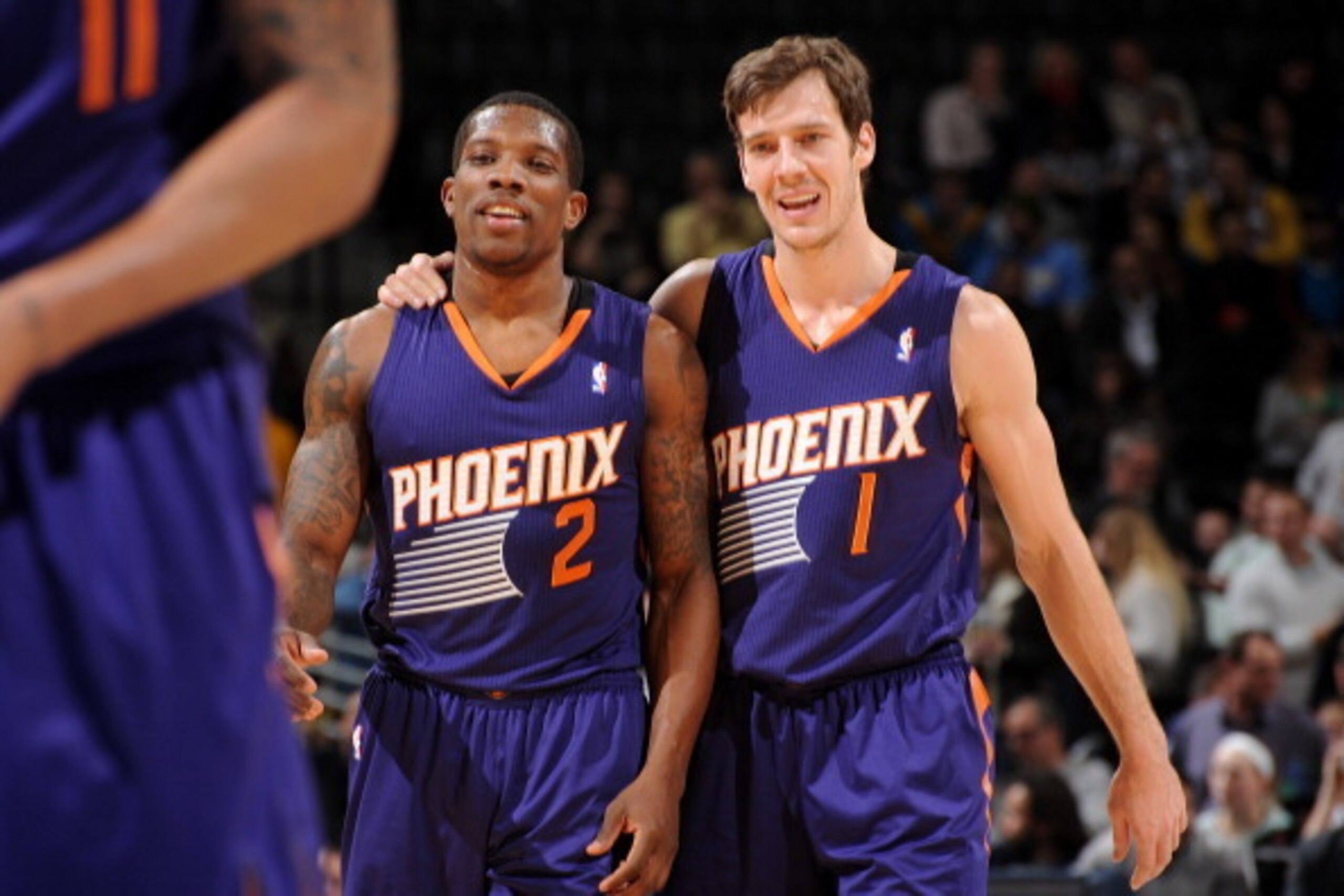DENVER, CO - December 20:  Eric Bledsoe #2 and Goran Dragic #1 of the Phoenix Suns smile and walk off the court against the Denver Nuggets on December 20, 2013 at the Pepsi Center in Denver, Colorado. NOTE TO USER: User expressly acknowledges and agrees t