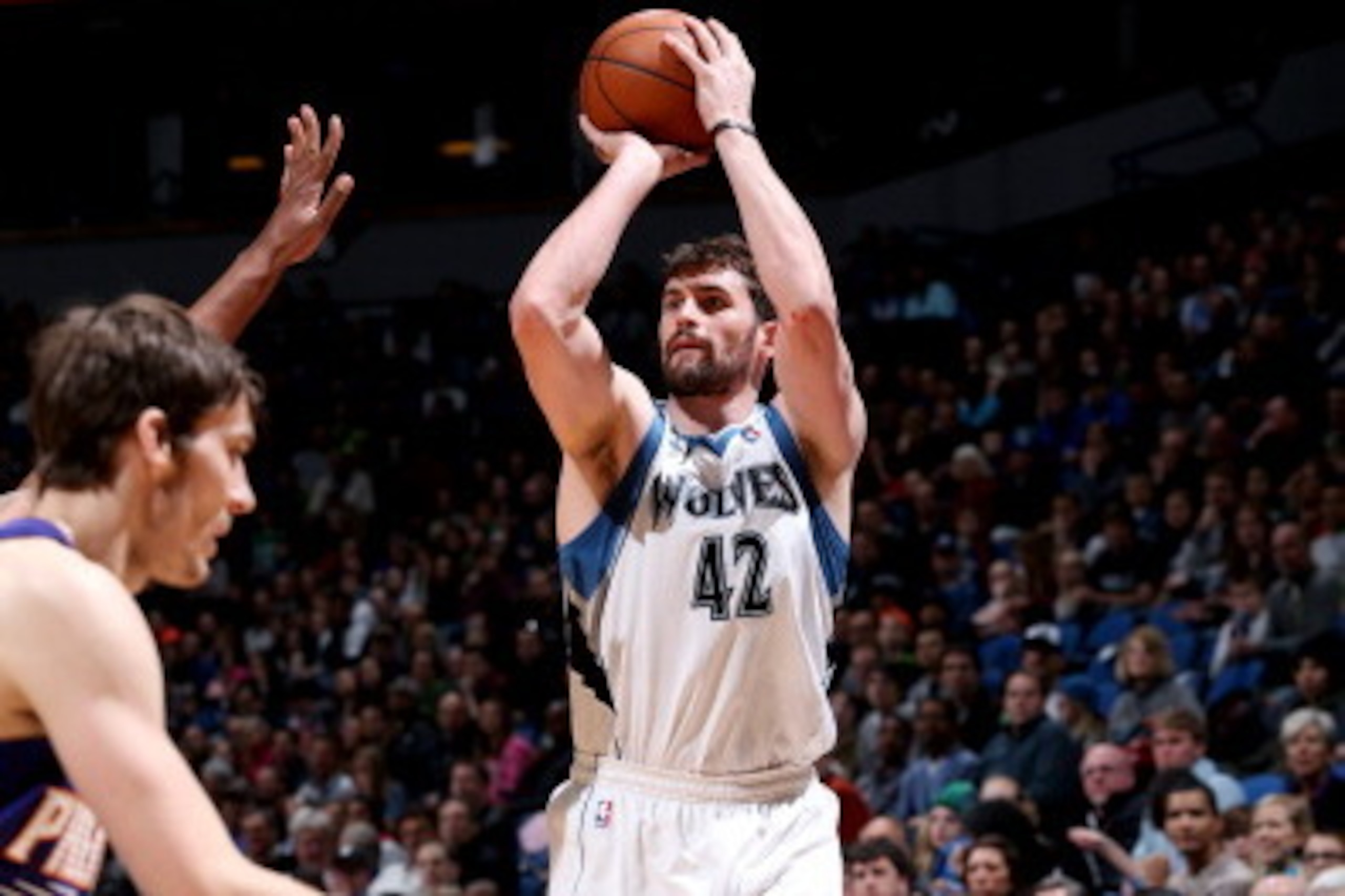 MINNEAPOLIS, MN - MARCH 23: Kevin Love #42 of the Minnesota Timberwolves shoots against the Phoenix Suns on March 23, 2014 at Target Center in Minneapolis, Minnesota. NOTE TO USER: User expressly acknowledges and agrees that, by downloading and or using t