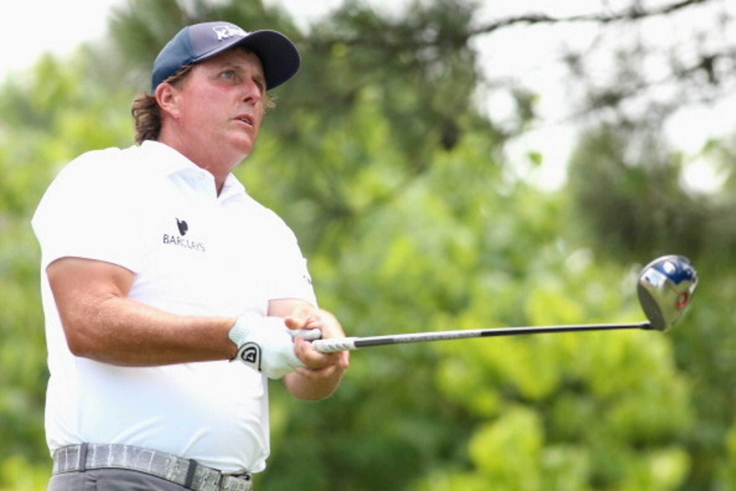 MEMPHIS, TN - JUNE 08:  Phil Mickelson watches his tee shot on the 18th hole during the final round of the FedEx St. Jude Classic at the TPC Southwind on June 8, 2014 in Memphis, Tennessee.  (Photo by Stephen Dunn/Getty Images)