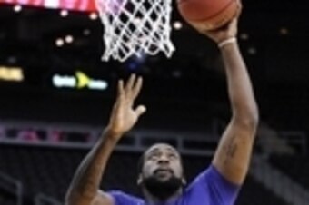 Mar 13, 2014; Kansas City, MO, USA; Kansas State Wildcats forward Thomas Gipson (42) warms up before the game against the Iowa State Cyclones in the second round of the Big 12 Conference college basketball tournament at Sprint Center. Mandatory Credit: De