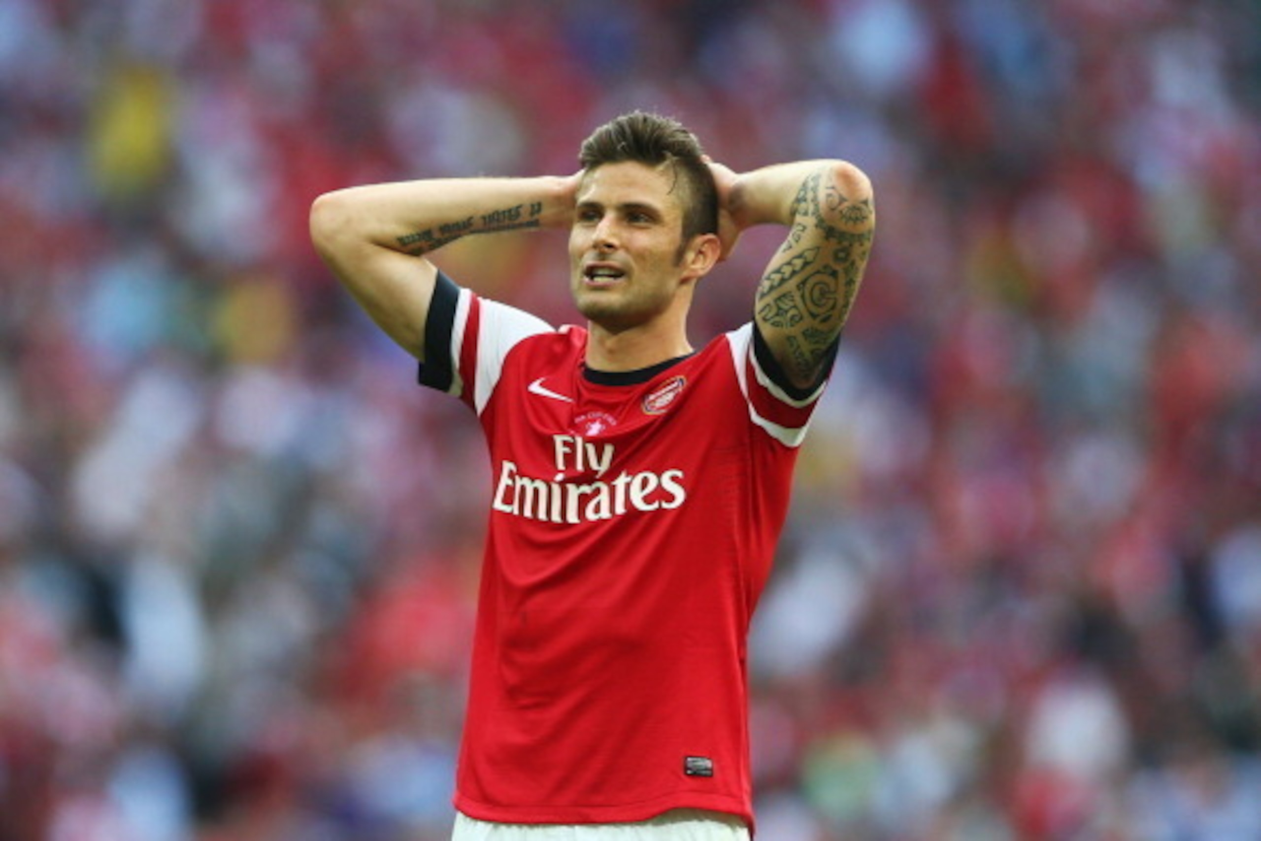 LONDON, ENGLAND - MAY 17:  Olivier Giroud of Arsenal reacts during the FA Cup with Budweiser Final match between Arsenal and Hull City at Wembley Stadium on May 17, 2014 in London, England.  (Photo by Paul Gilham/Getty Images)