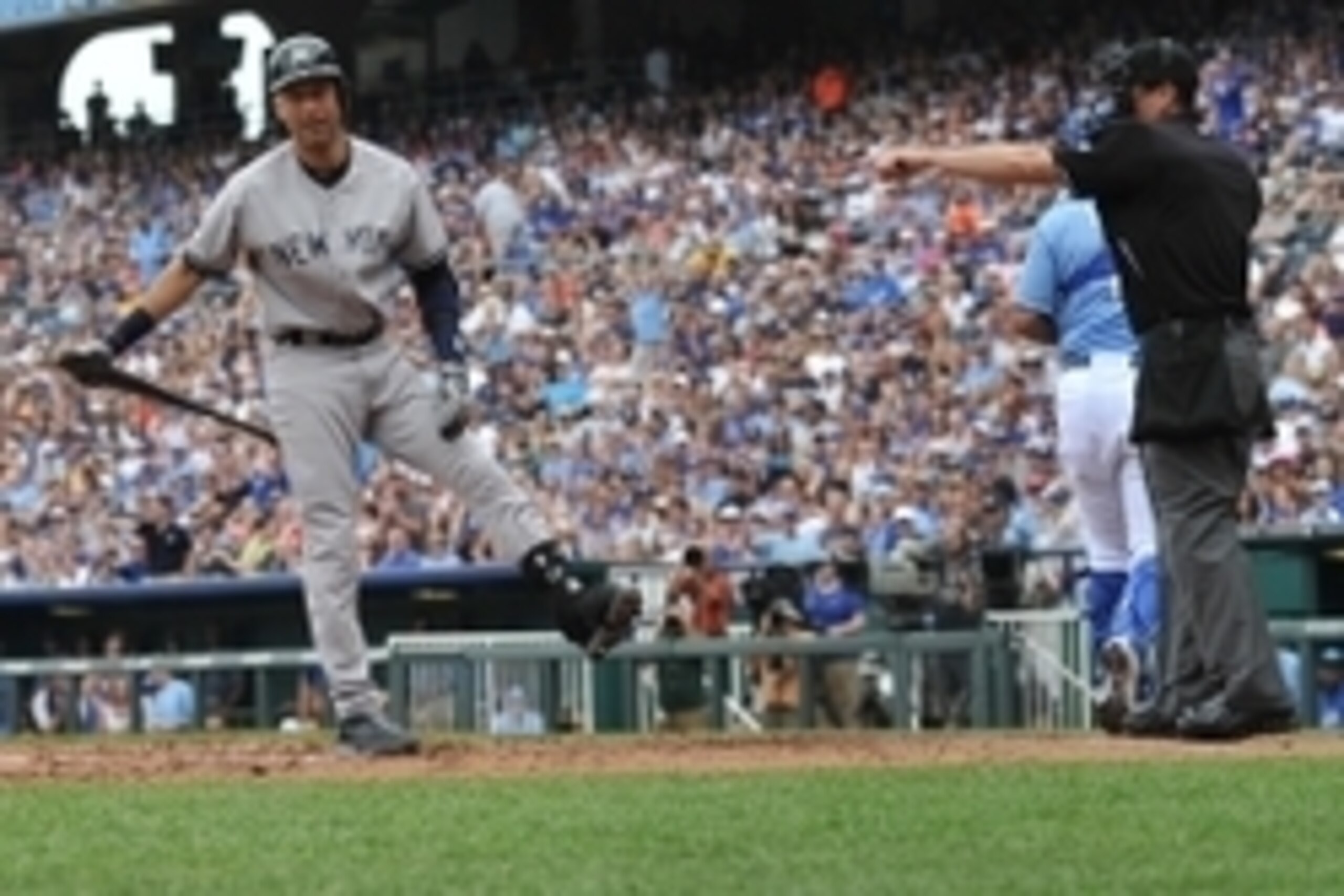 Jun 8, 2014; Kansas City, MO, USA; New York Yankees shortstop Derek Jeter (2) reacts after striking out with the bases loaded to end the top of the second inning against the Kansas City Royals at Kauffman Stadium. Mandatory Credit: Peter G. Aiken-USA TODA Jun 8, 2014; Kansas City, MO, USA; New York Yankees shortstop Derek Jeter (2) reacts after striking out with the bases loaded to end the top of the second inning against the Kansas City Royals at Kauffman Stadium. Mandatory Credit: Peter G. Aiken-USA TODA