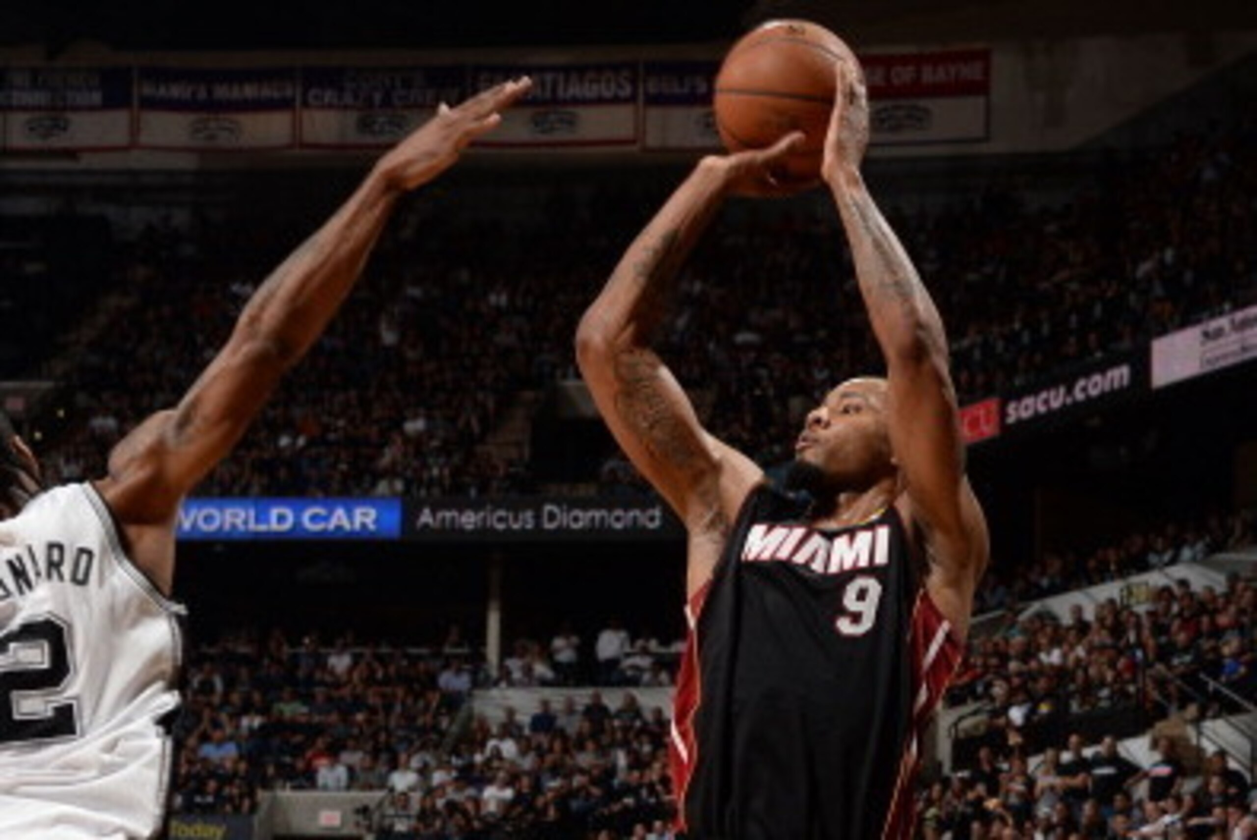 SAN ANTONIO, TX - JUNE 08: Rashard Lewis #9 of the Miami Heat shoots against Kawhi Leonard #2 of the San Antonio Spurs during Game Two of the 2014 NBA Finals between the Miami Heat and San Antonio Spurs at AT&T Center on June 8, 2014 in San Antonio, Texas