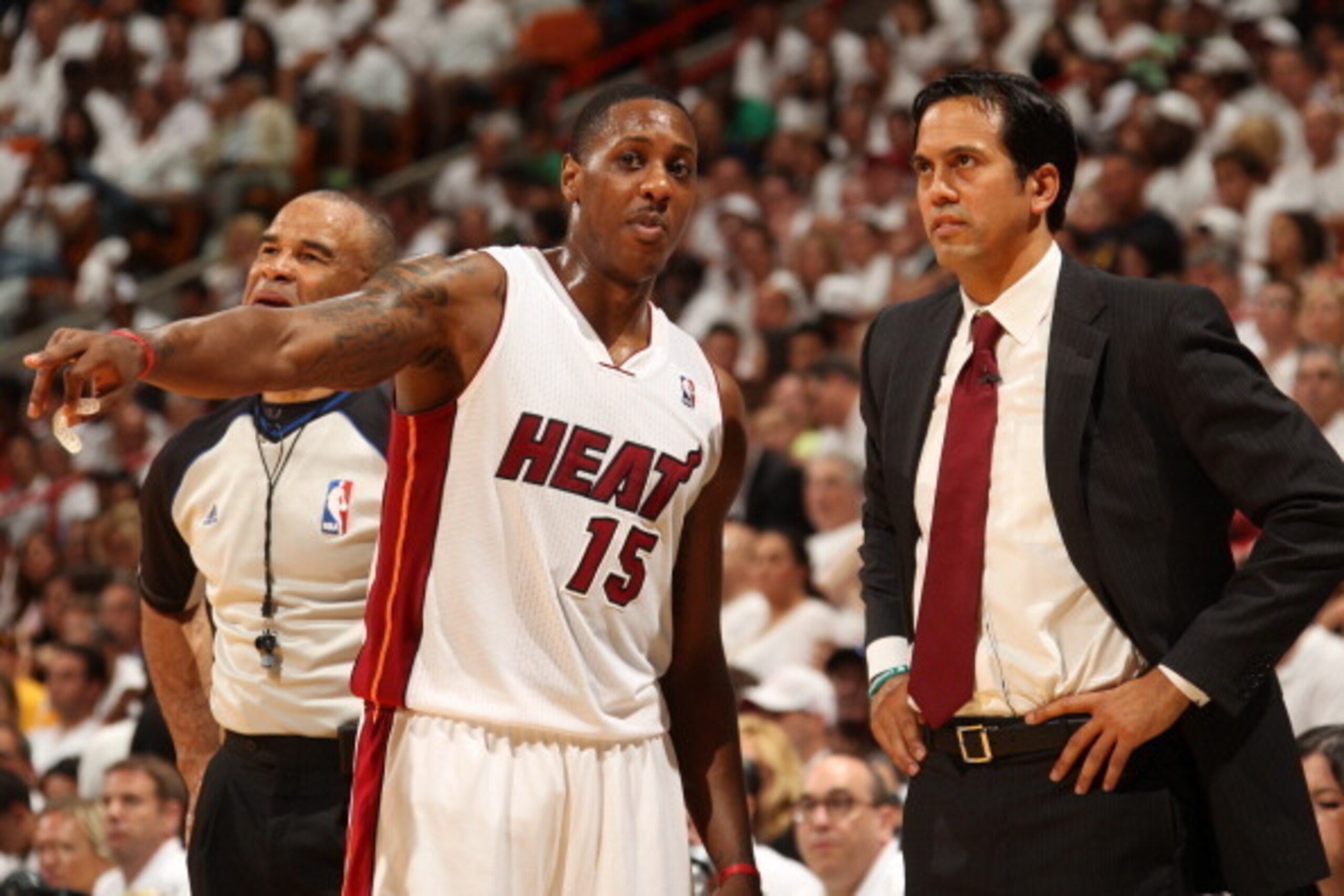 MIAMI, FL - May 26: Mario Chalmers #15 of the Miami Heat talks with Erik Spoelstra of the Miami Heat against the Indiana Pacers in Game Four of the Eastern Conference Finals during the 2014 NBA Playoffs at the American Airlines Arena in Miami, Florida on 