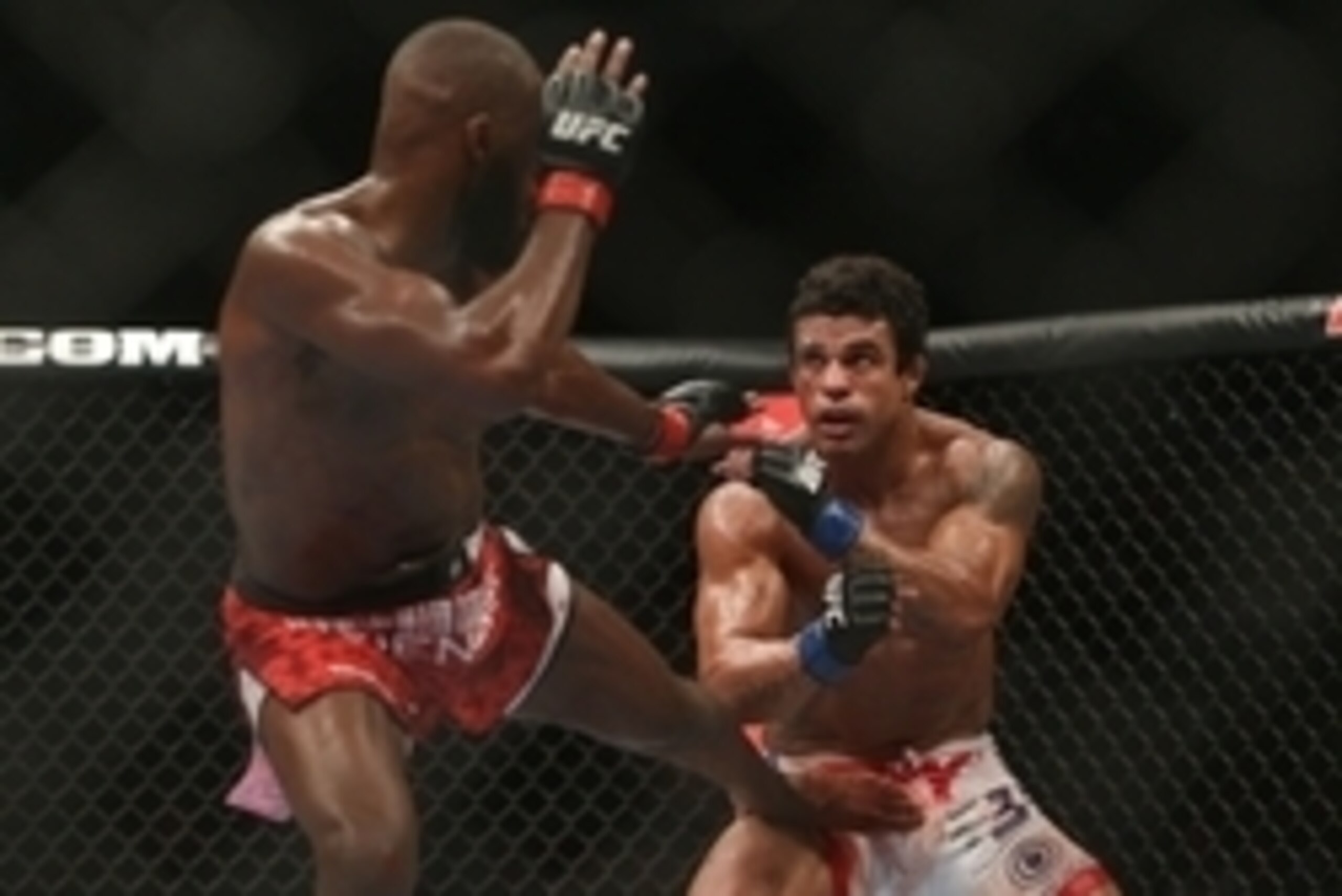 Sep 22, 2012; Toronto, ON, Canada; UFC fighter Jon Jones (left) against fighter Vitor Belfort during a light heavyweight bout at UFC 152 at the Air Canada Centre. Mandatory Credit: Tom Szczerbowski-USA TODAY Sports