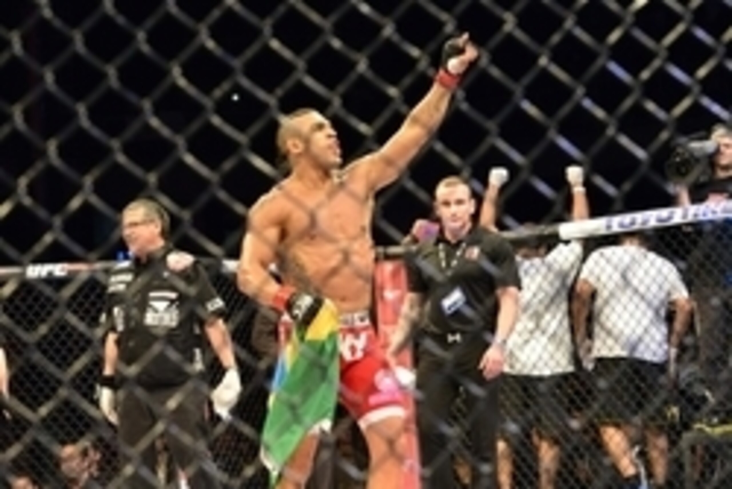 May 18, 2013; Jaragua do Sul, BRAZIL; Vitor Belfort (red shorts) celebrates after defeating  Luke Rockhold (not pictured) during UFC on FX 8 at ARena Jaragua. Mandatory Credit: Jason da Silva-USA TODAY Sports