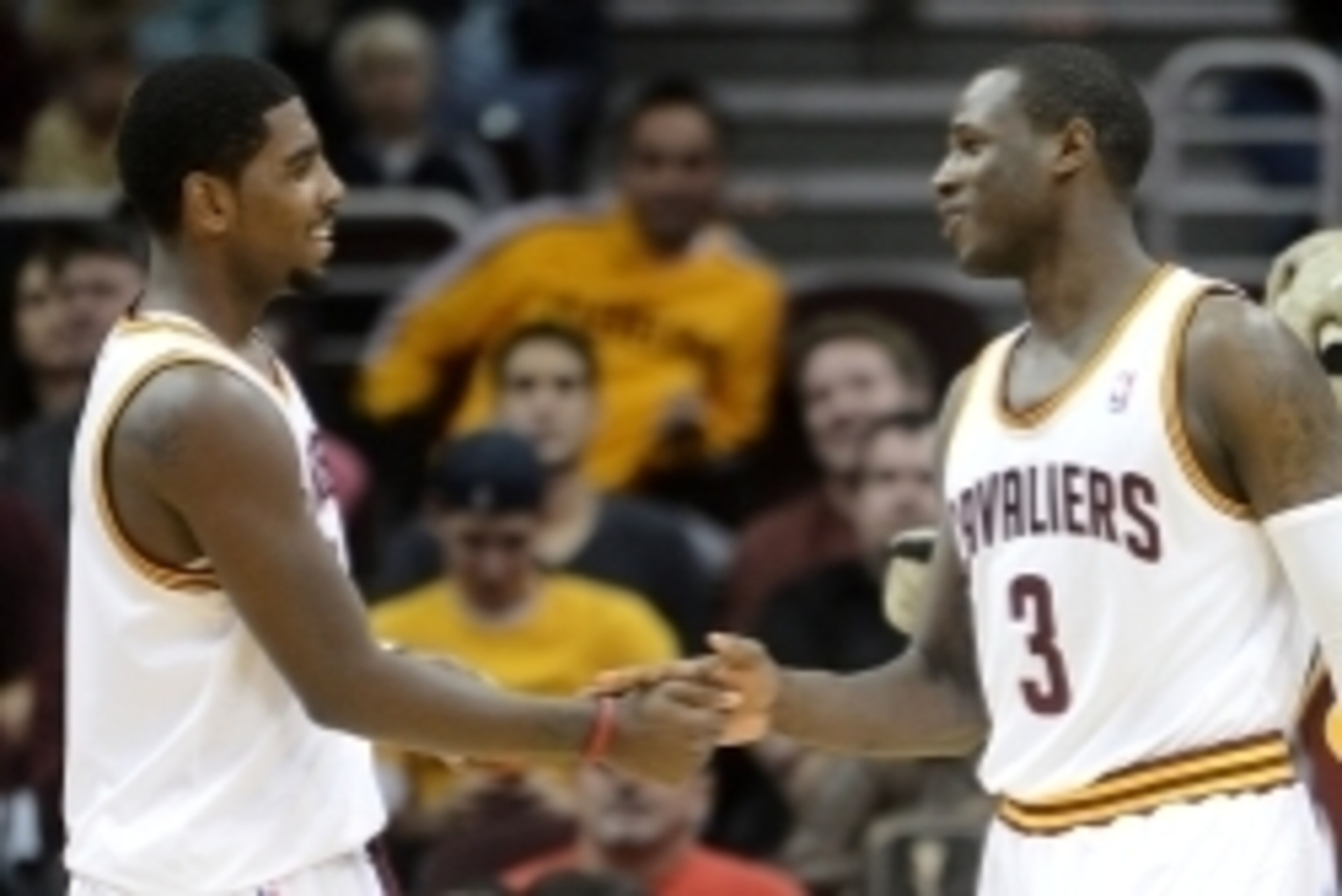 October 23, 2012; Cleveland, OH USA: Cleveland Cavaliers point guard Kyrie Irving (2) and guard Dion Waiters shake hands during a preseason game against the Indiana Pacers at Quicken Loans Arena.  Mandatory Credit: Eric P. Mull-USPRESSWIRE