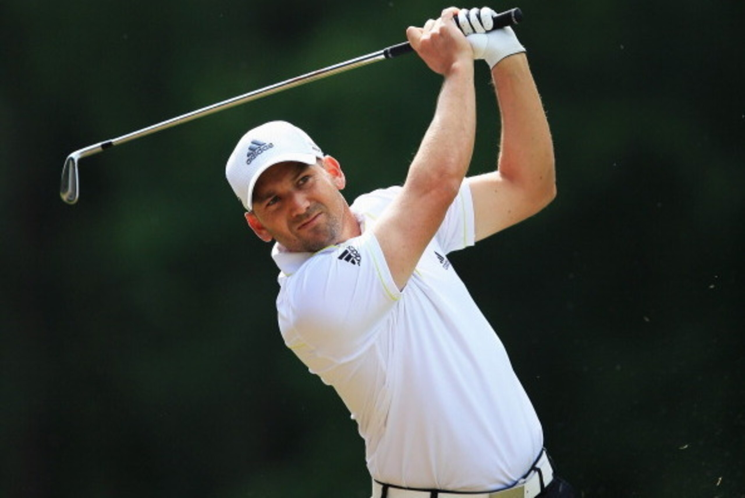 VIRGINIA WATER, ENGLAND - MAY 22:  Sergio Garcia of Spain hits his 2nd shot on the 6th hole during day one of the BMW PGA Championship at Wentworth on May 22, 2014 in Virginia Water, England.  (Photo by David Cannon/Getty Images)