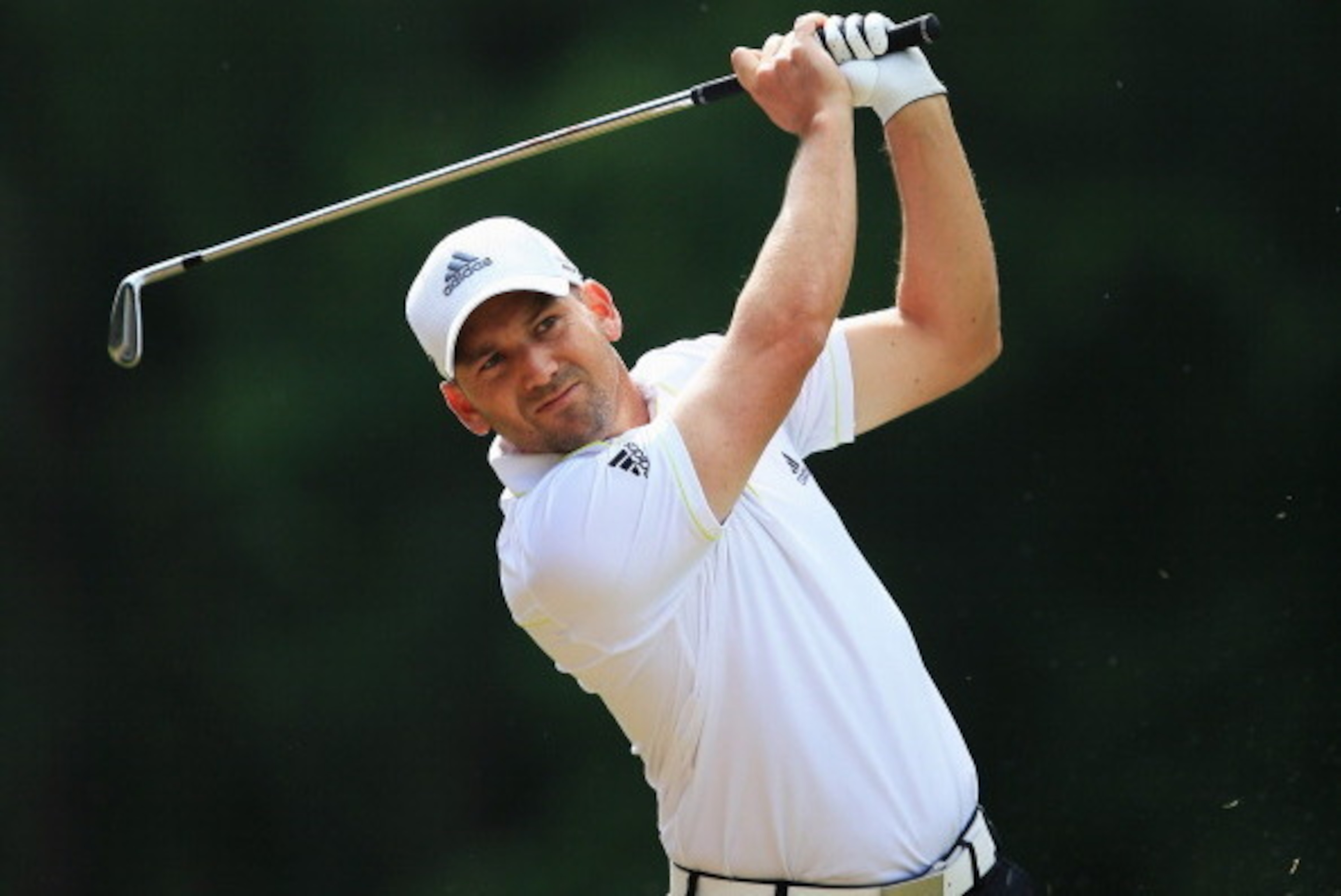 VIRGINIA WATER, ENGLAND - MAY 22:  Sergio Garcia of Spain hits his 2nd shot on the 6th hole during day one of the BMW PGA Championship at Wentworth on May 22, 2014 in Virginia Water, England.  (Photo by David Cannon/Getty Images)