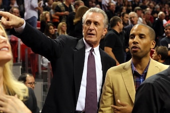 MIAMI - OCTOBER 29: Team President Pat Riley of the Miami Heat and LeBron James associate Maverick Carter look on in the stands prior to the game between the Orlando Magic and Miami Heat at the American Airlines Arena on October 29, 2010 in Miami, Florida